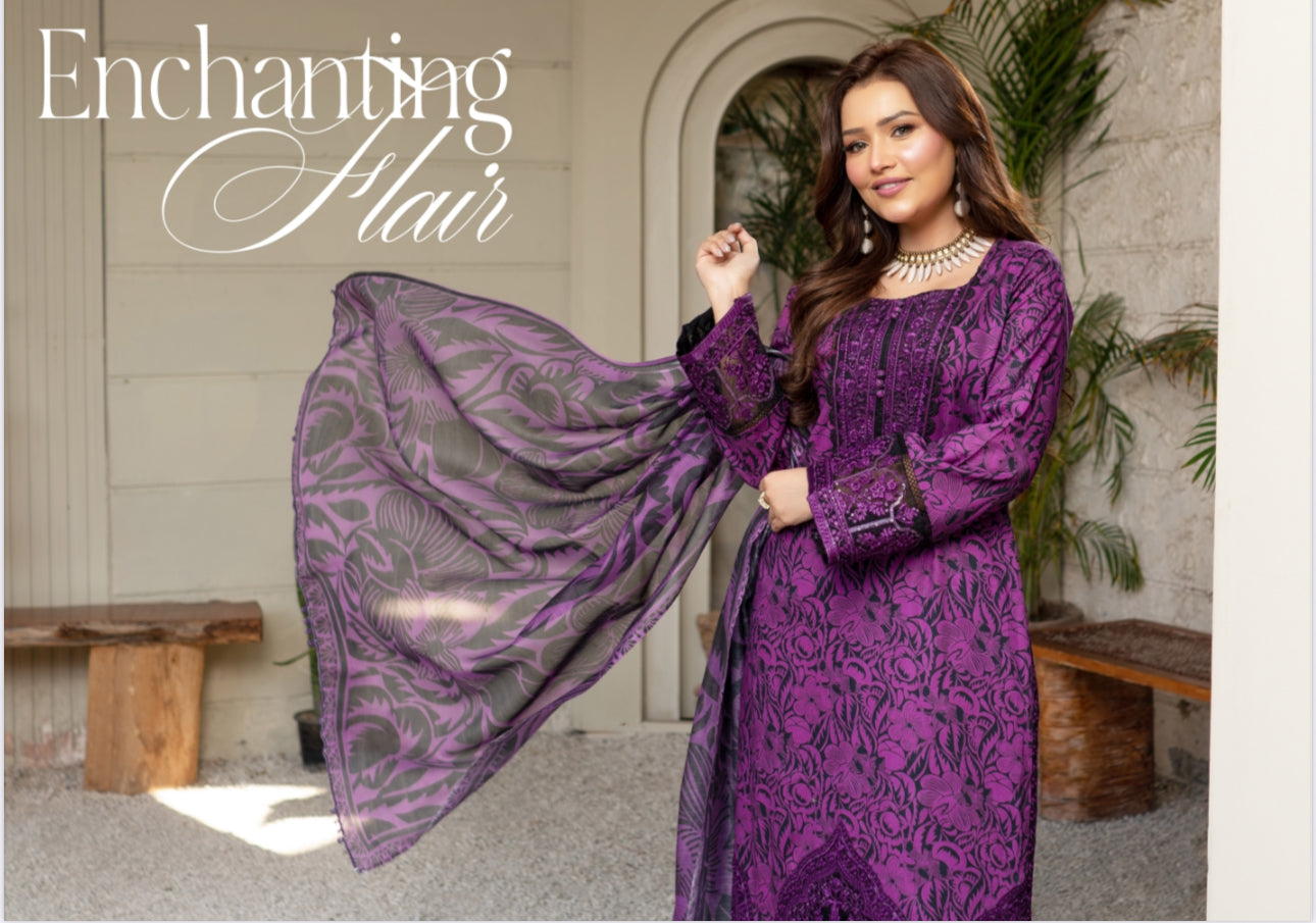 Traditional Pakistani Salwar Kameez by Saree Ghor Charlotte, featuring intricate embroidery and vibrant ethnic wear for women.