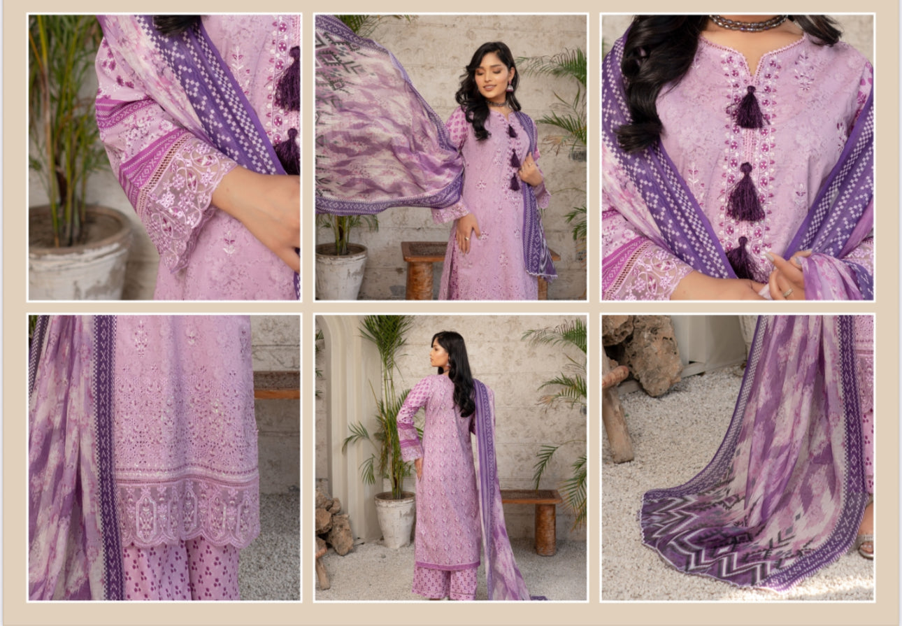 Traditional Pakistani Salwar Kameez by Saree Ghor Charlotte, featuring vibrant ethnic wear with intricate embroidery for women.