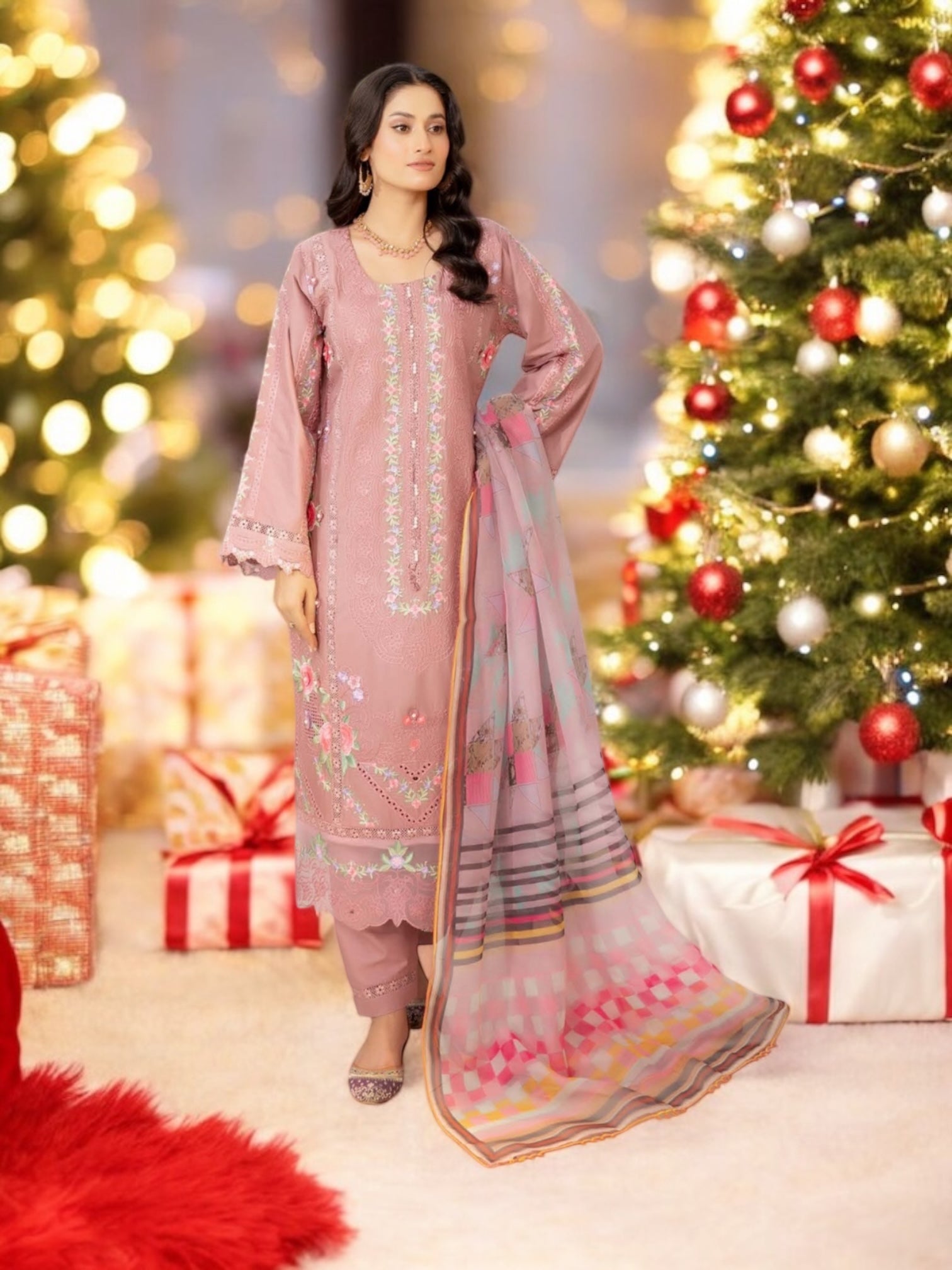 Traditional Pakistani Salwar Kameez by Saree Ghor Charlotte, featuring intricate embroidery and vibrant ethnic wear for women.