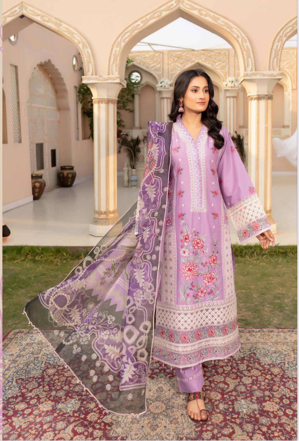 Traditional Pakistani Salwar Kameez by Saree Ghor Charlotte, ethnic wear for women with intricate embroidery and vibrant colors.