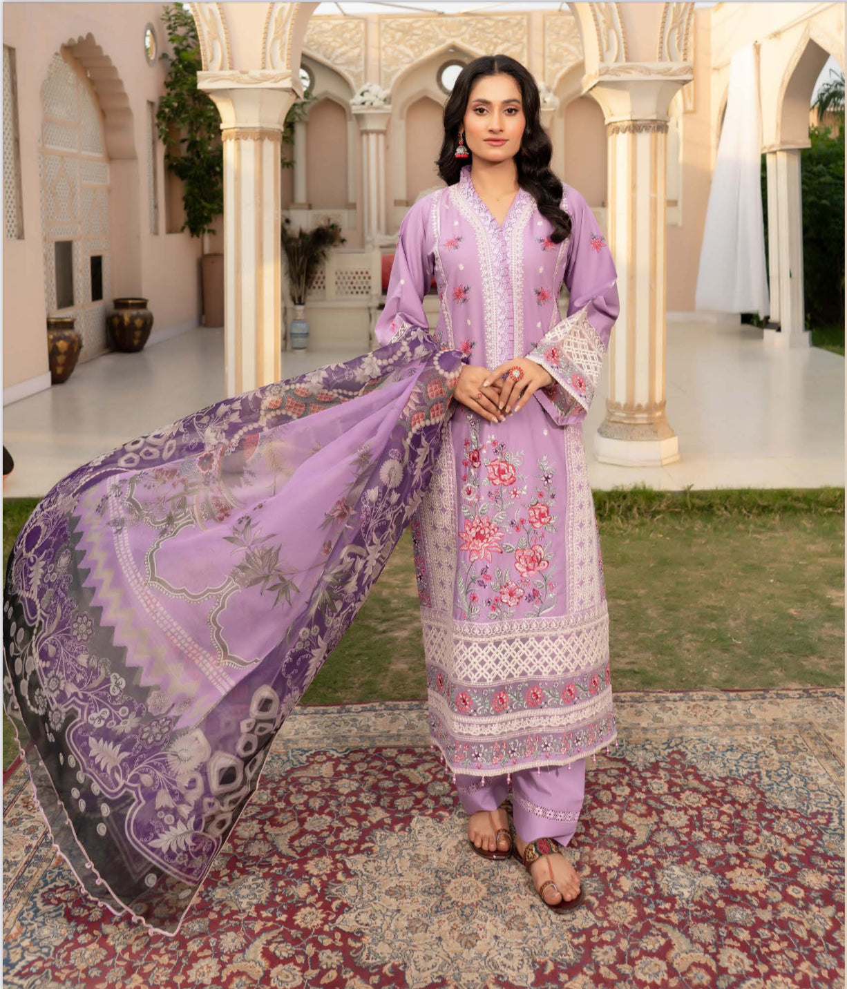 Traditional Pakistani Salwar Kameez by Saree Ghor Charlotte, ethnic women's wear with intricate embroidery and vibrant colors.