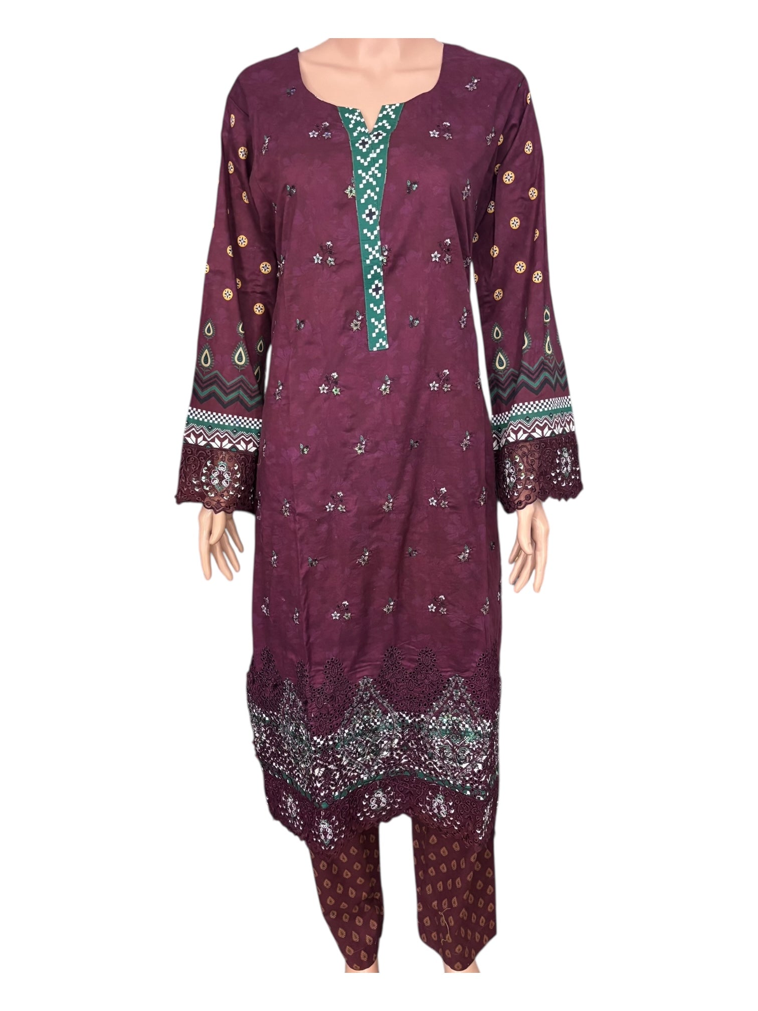 Traditional Pakistani Salwar Kameez by Saree Ghor Charlotte, featuring intricate embroidery and vibrant ethnic wear for women.