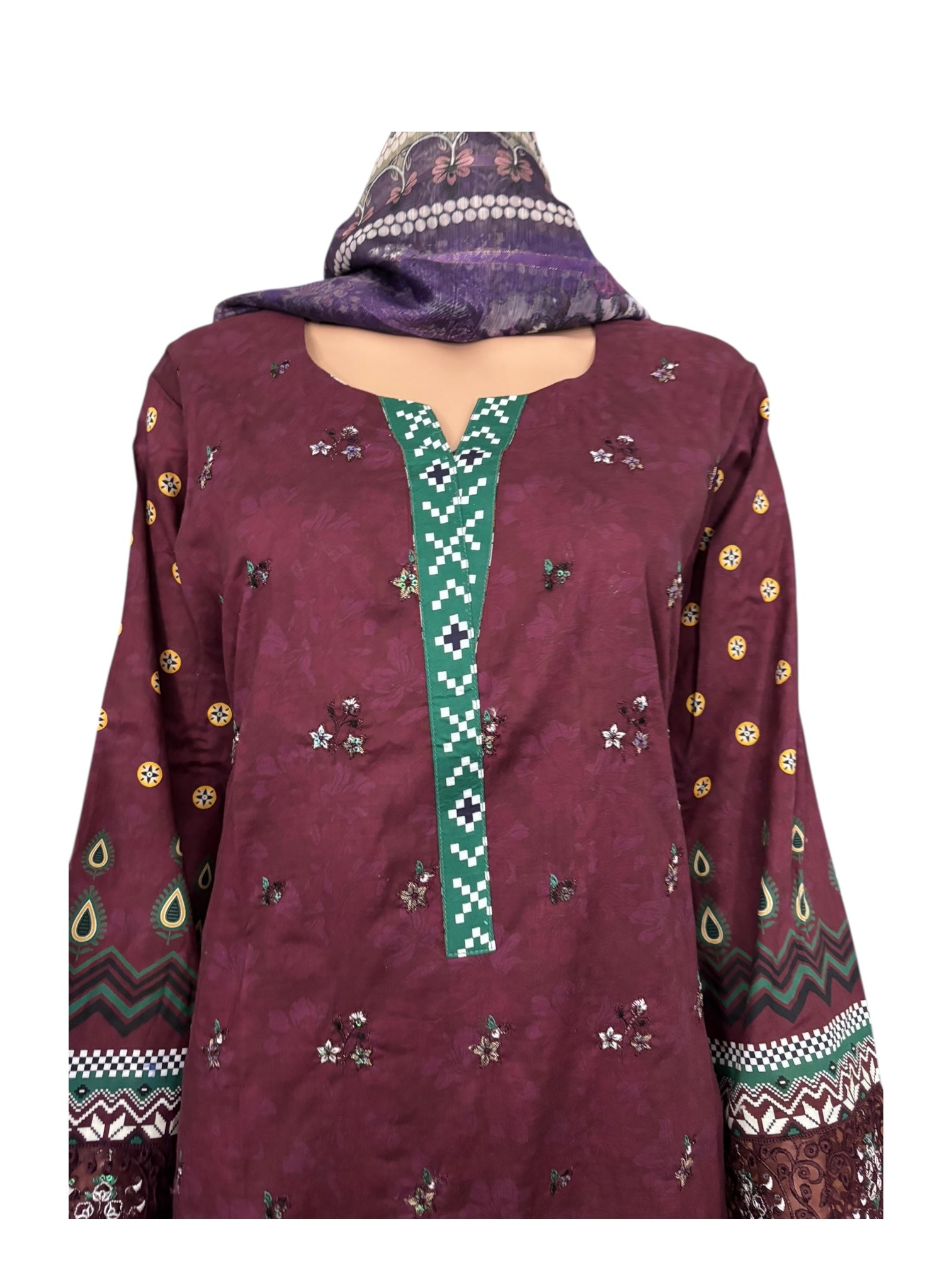 Traditional Pakistani Salwar Kameez by Saree Ghor Charlotte, ethnic wear for women featuring vibrant fabric and intricate embroidery.