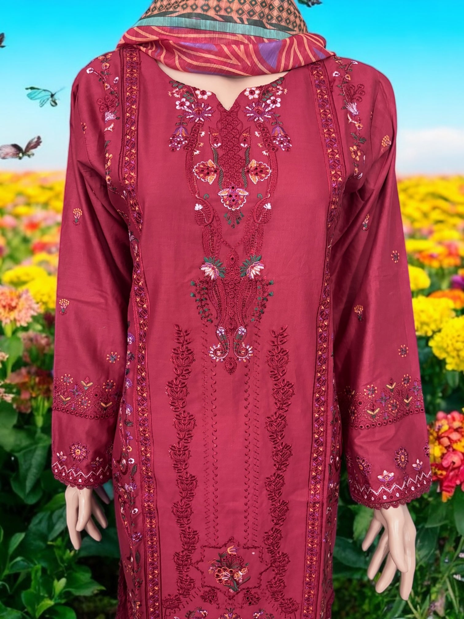Traditional Pakistani Salwar Kameez by Saree Ghor Charlotte, ethnic wear for women featuring vibrant fabric and intricate embroidery.