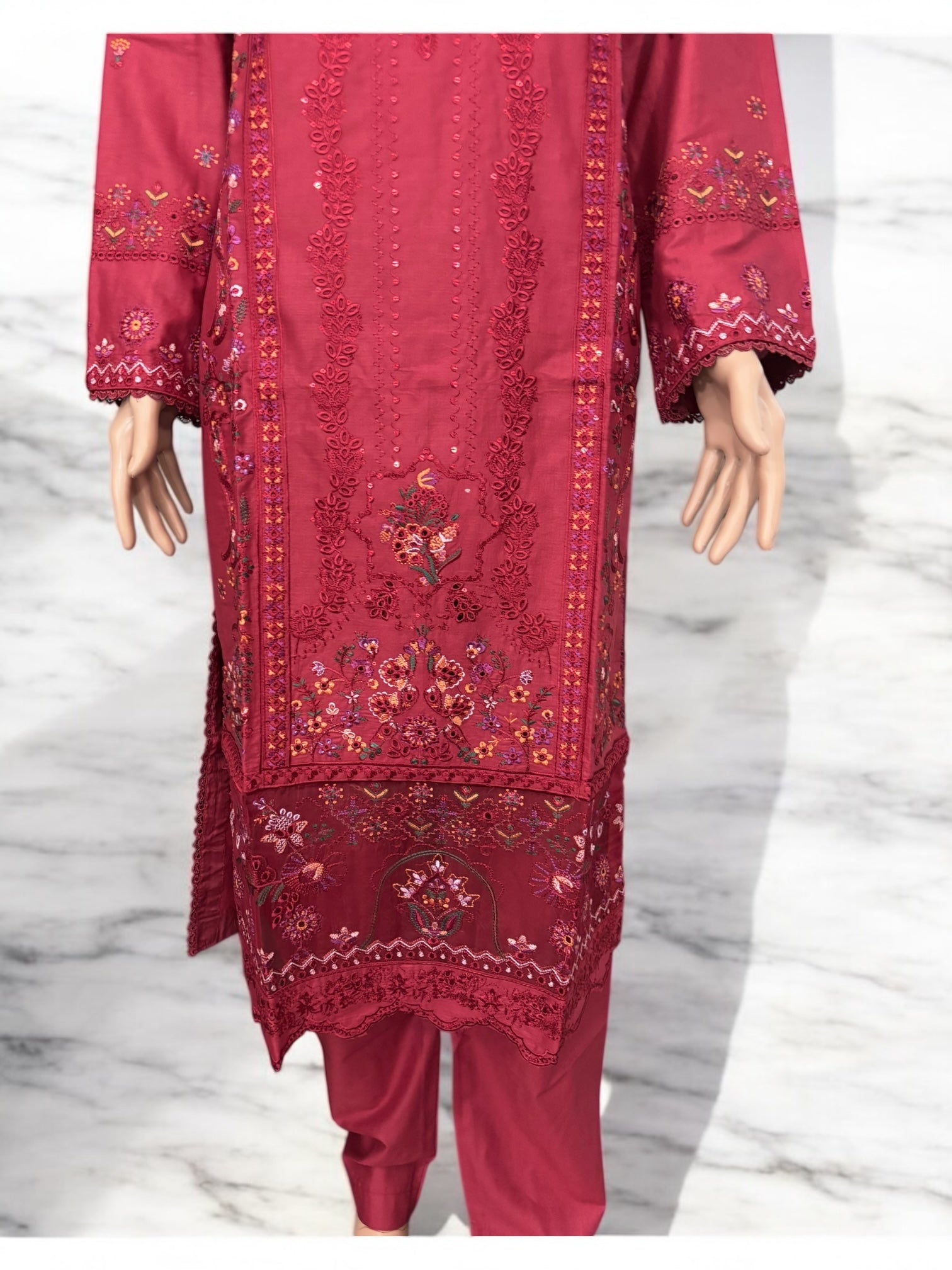 Traditional Pakistani Salwar Kameez by Saree Ghor Charlotte, featuring vibrant ethnic wear for women with intricate detailing.
