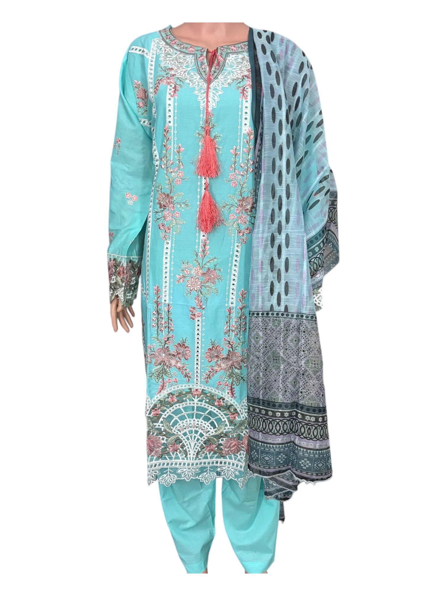 Traditional Pakistani Salwar Kameez by Saree Ghor Charlotte, vibrant ethnic wear for women with detailed embroidery and colorful fabric.