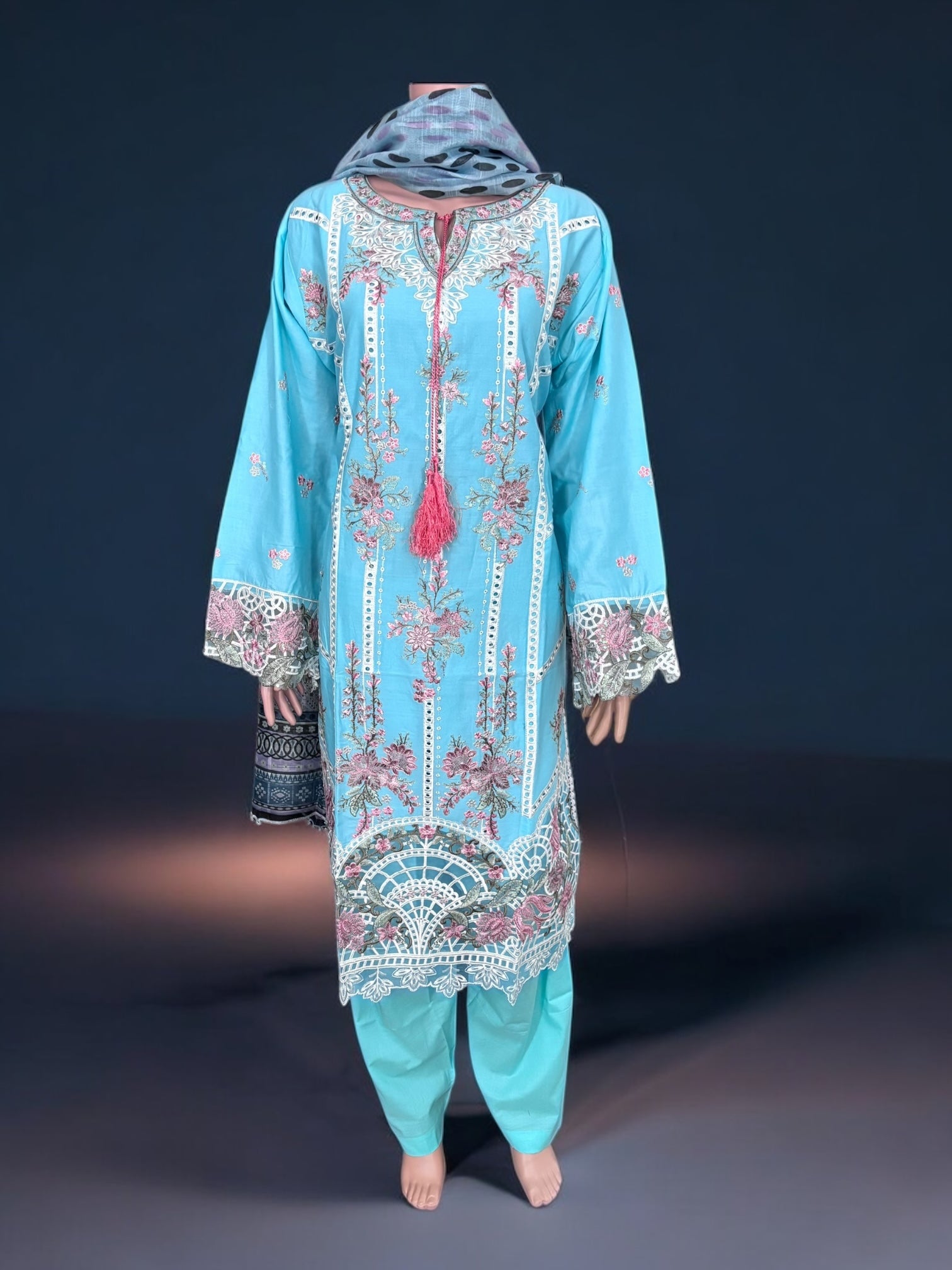Traditional Pakistani Salwar Kameez by Saree Ghor Charlotte, vibrant ethnic wear for women with intricate embroidery and colorful fabric.