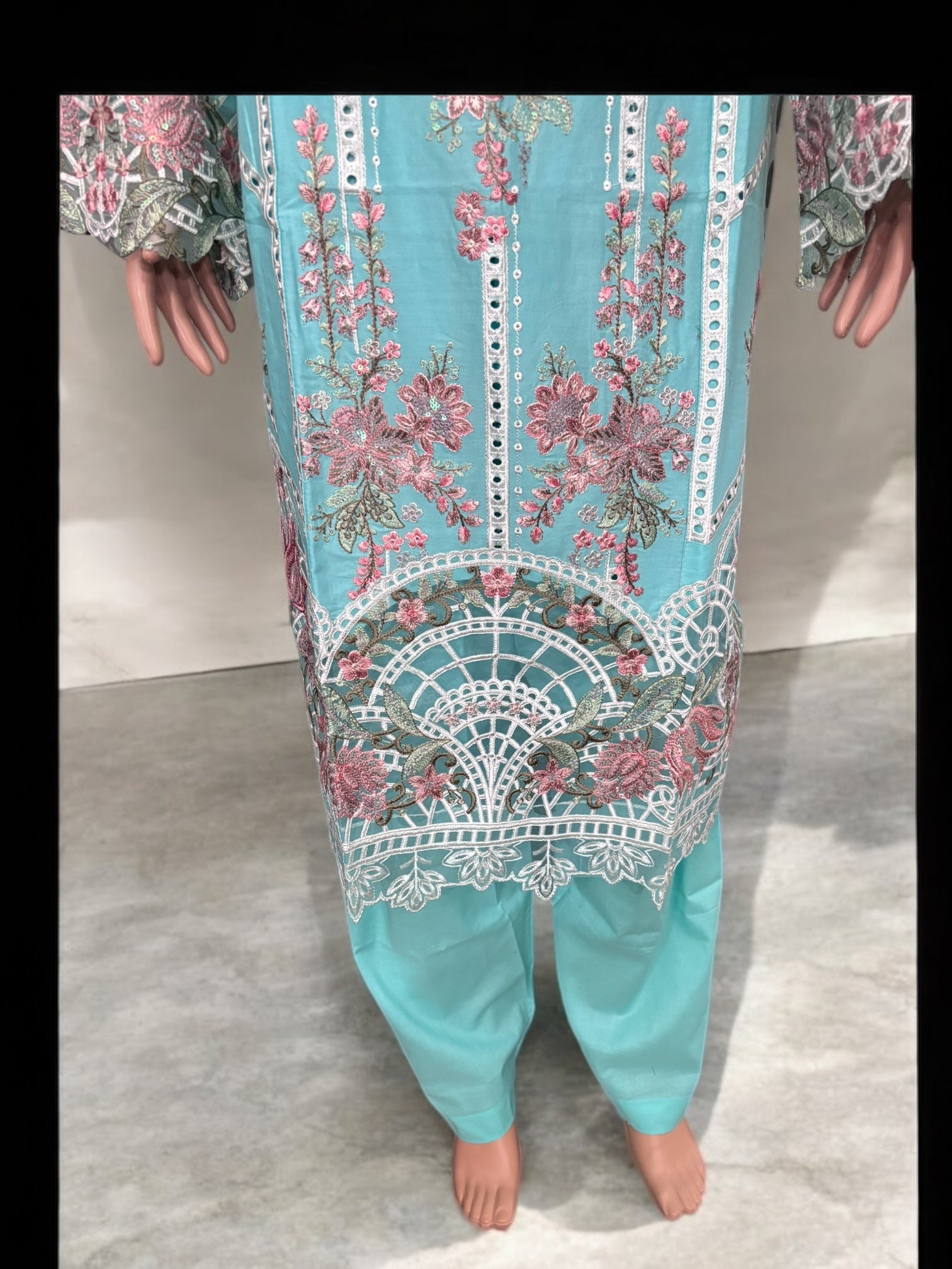 Traditional Pakistani Salwar Kameez by Saree Ghor Charlotte, featuring intricate embroidery and vibrant ethnic wear for women.
