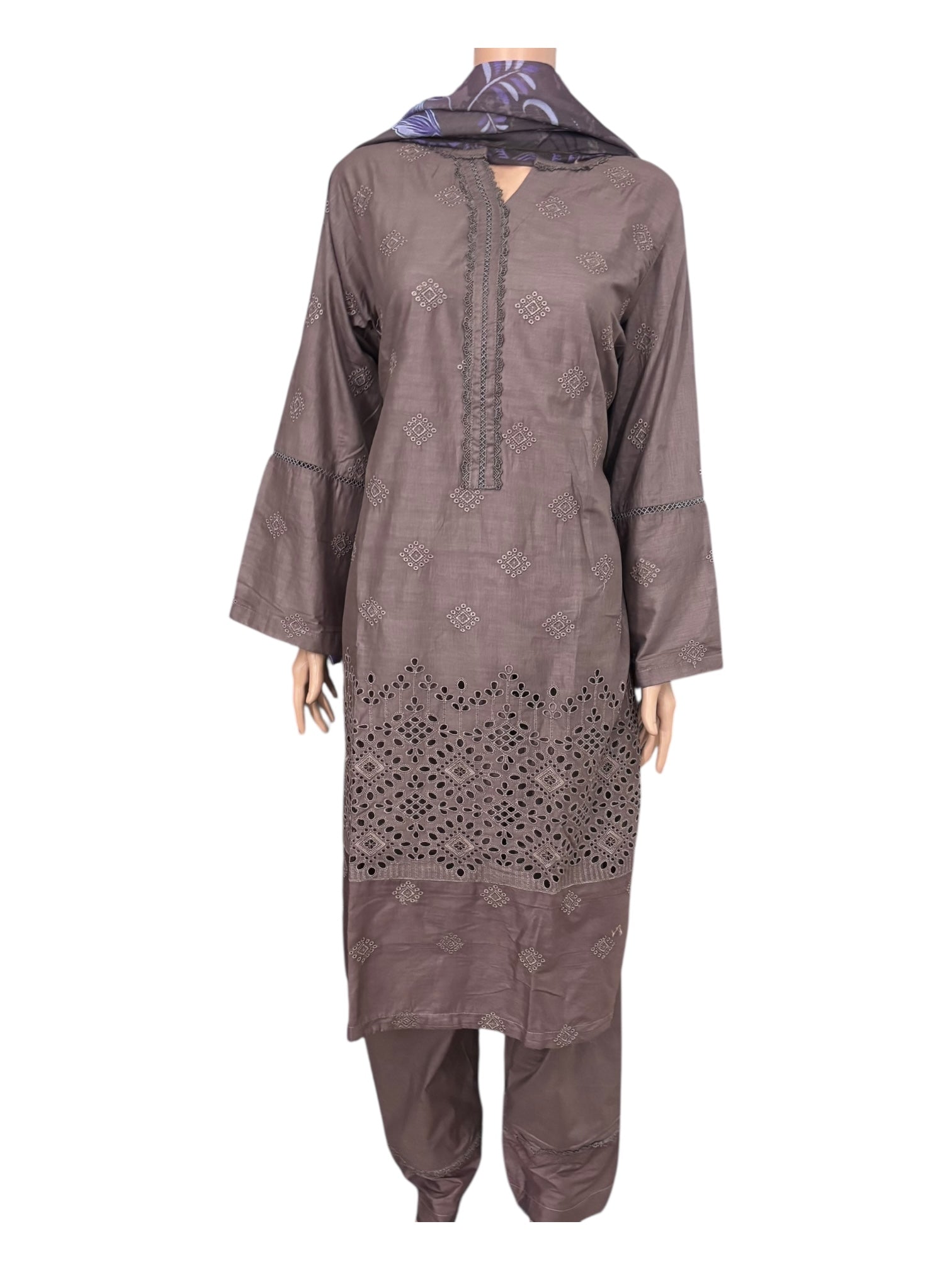 Traditional Pakistani Salwar Kameez by Saree Ghor Charlotte, vibrant ethnic wear for women with intricate design and colorful fabric.