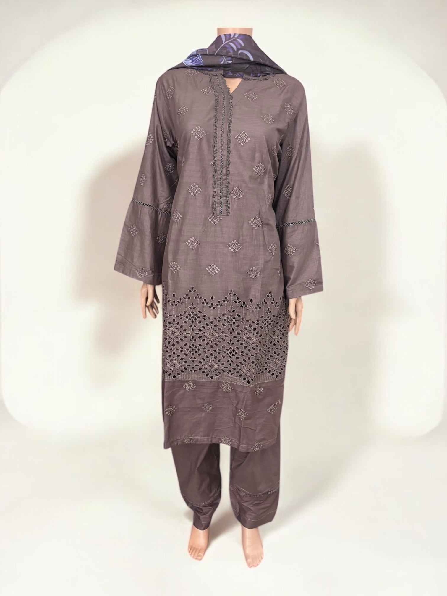Traditional Pakistani Salwar Kameez by Saree Ghor Charlotte, featuring vibrant ethnic wear for women with intricate embroidery.