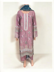 Traditional Pakistani Salwar Kameez by Saree Ghor Charlotte, featuring vibrant ethnic wear for women with intricate fabric details.