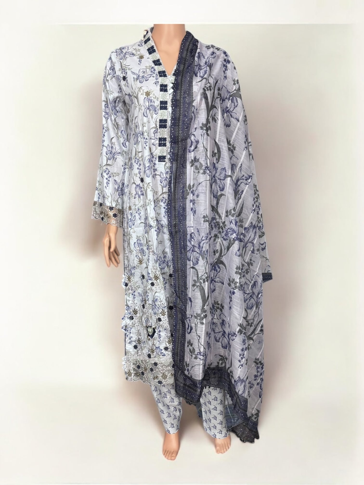 Traditional Pakistani Salwar Kameez by Saree Ghor Charlotte, featuring vibrant ethnic wear for women with intricate designs.