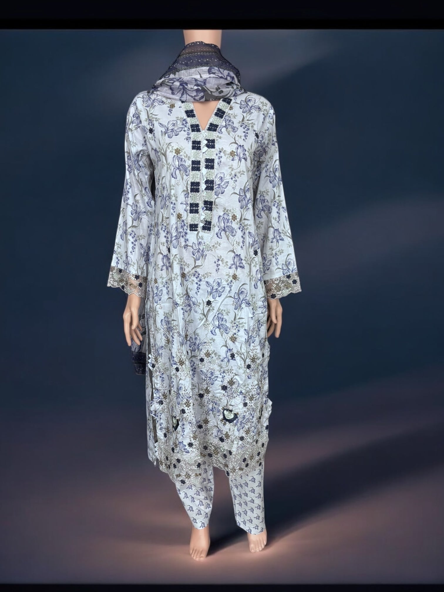 Traditional Pakistani Salwar Kameez by Saree Ghor Charlotte, ethnic wear for women with intricate embroidery and vibrant fabric.