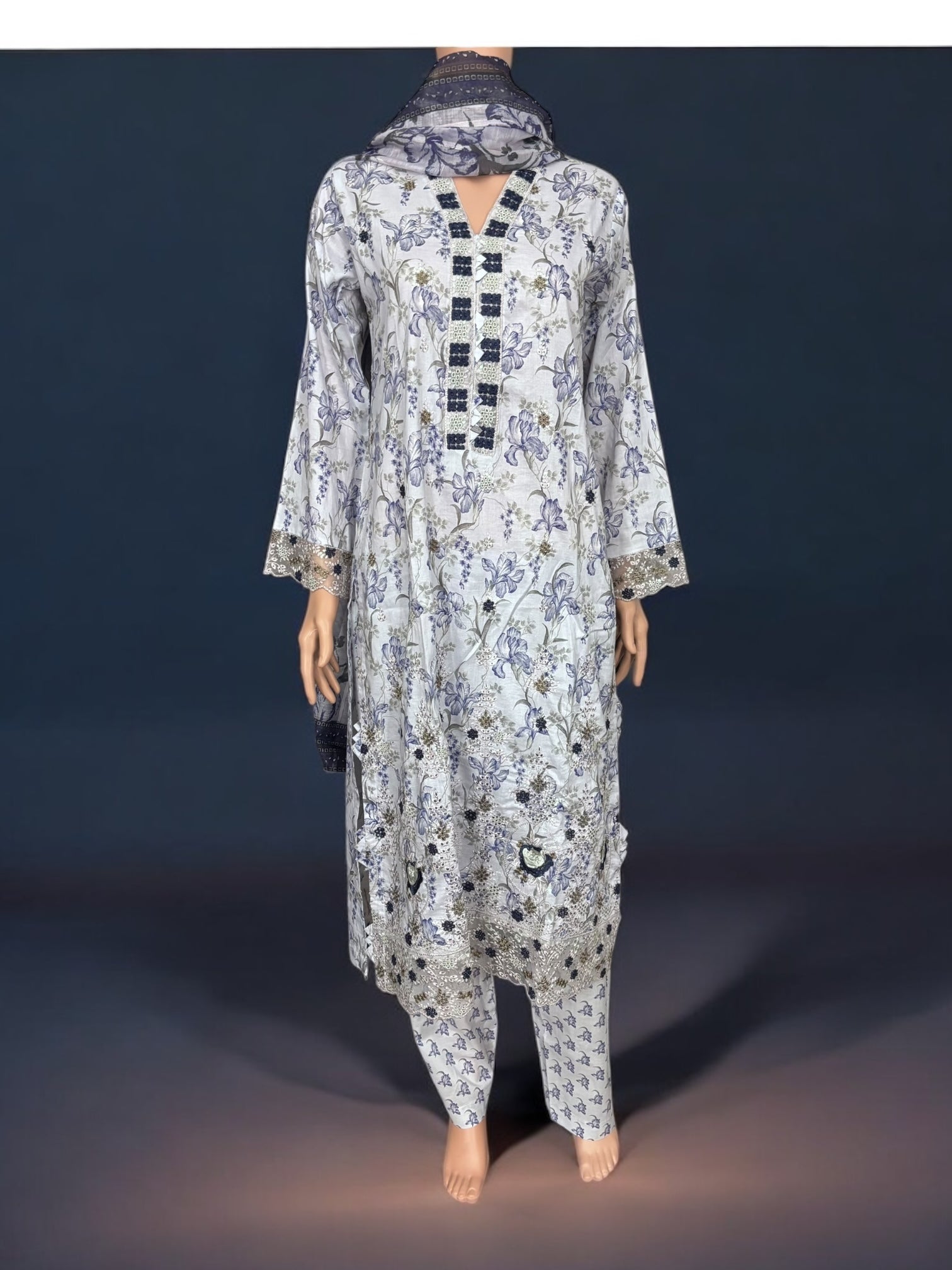 Traditional Pakistani Salwar Kameez by Saree Ghor Charlotte, featuring vibrant ethnic wear for women with intricate designs.