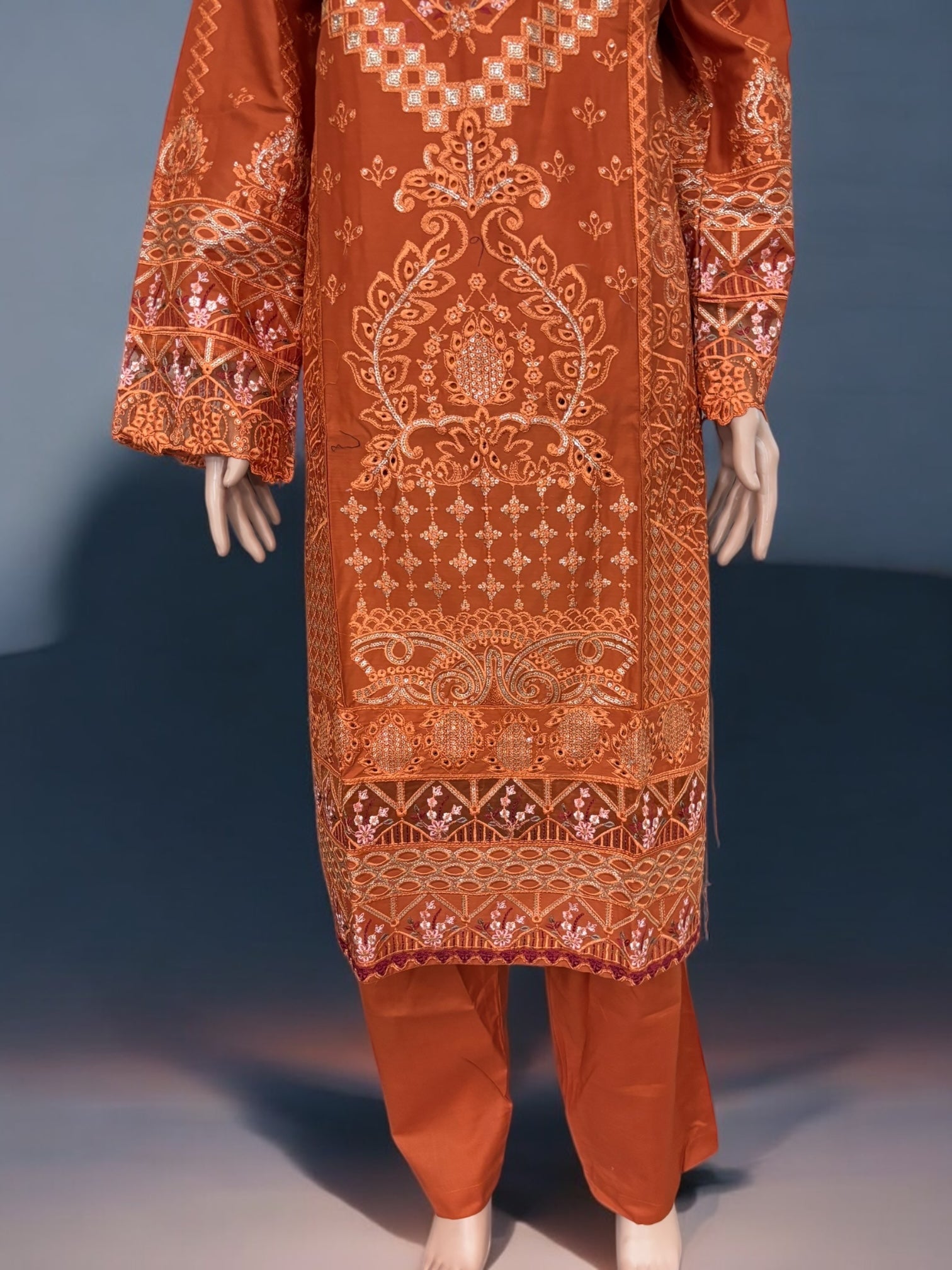 Traditional Pakistani Salwar Kameez by Saree Ghor Charlotte featuring intricate embroidery and vibrant cultural wear for women.