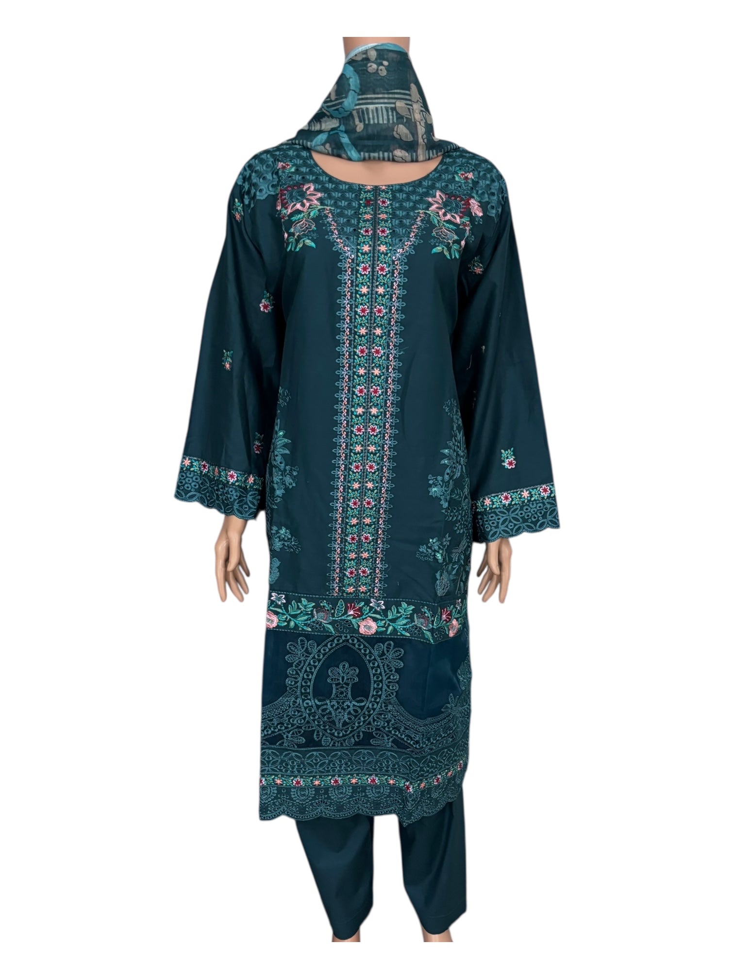 Traditional Pakistani Salwar Kameez by Saree Ghor Charlotte, featuring intricate embroidery and vibrant ethnic wear for women.
