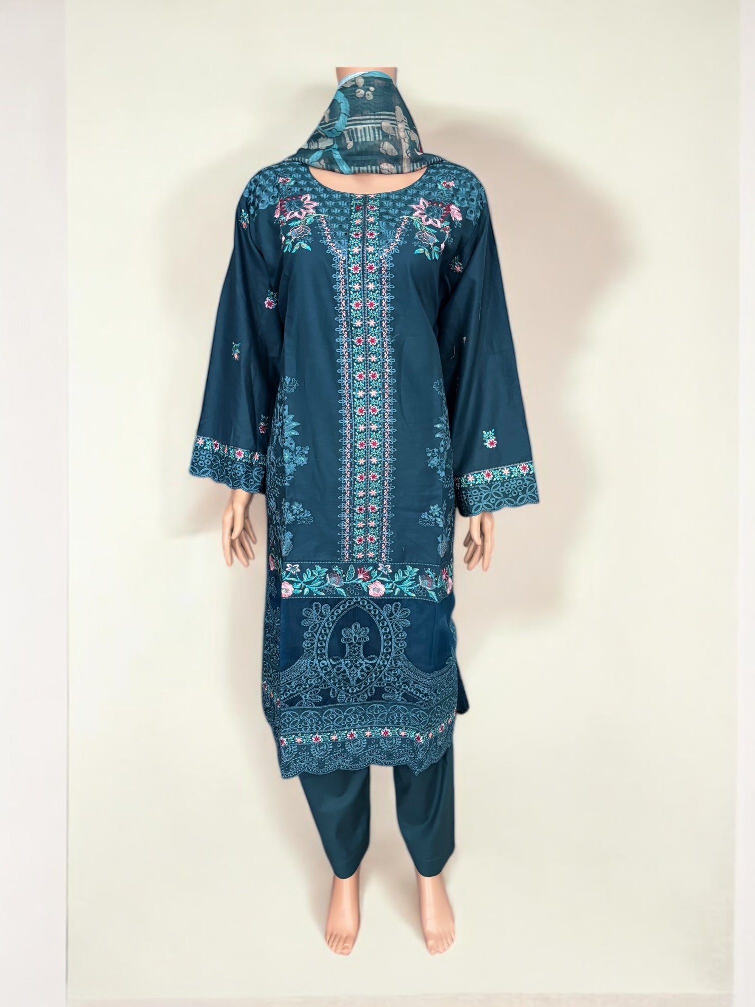 Traditional Pakistani Salwar Kameez by Saree Ghor Charlotte, featuring vibrant ethnic wear for women with intricate design details.