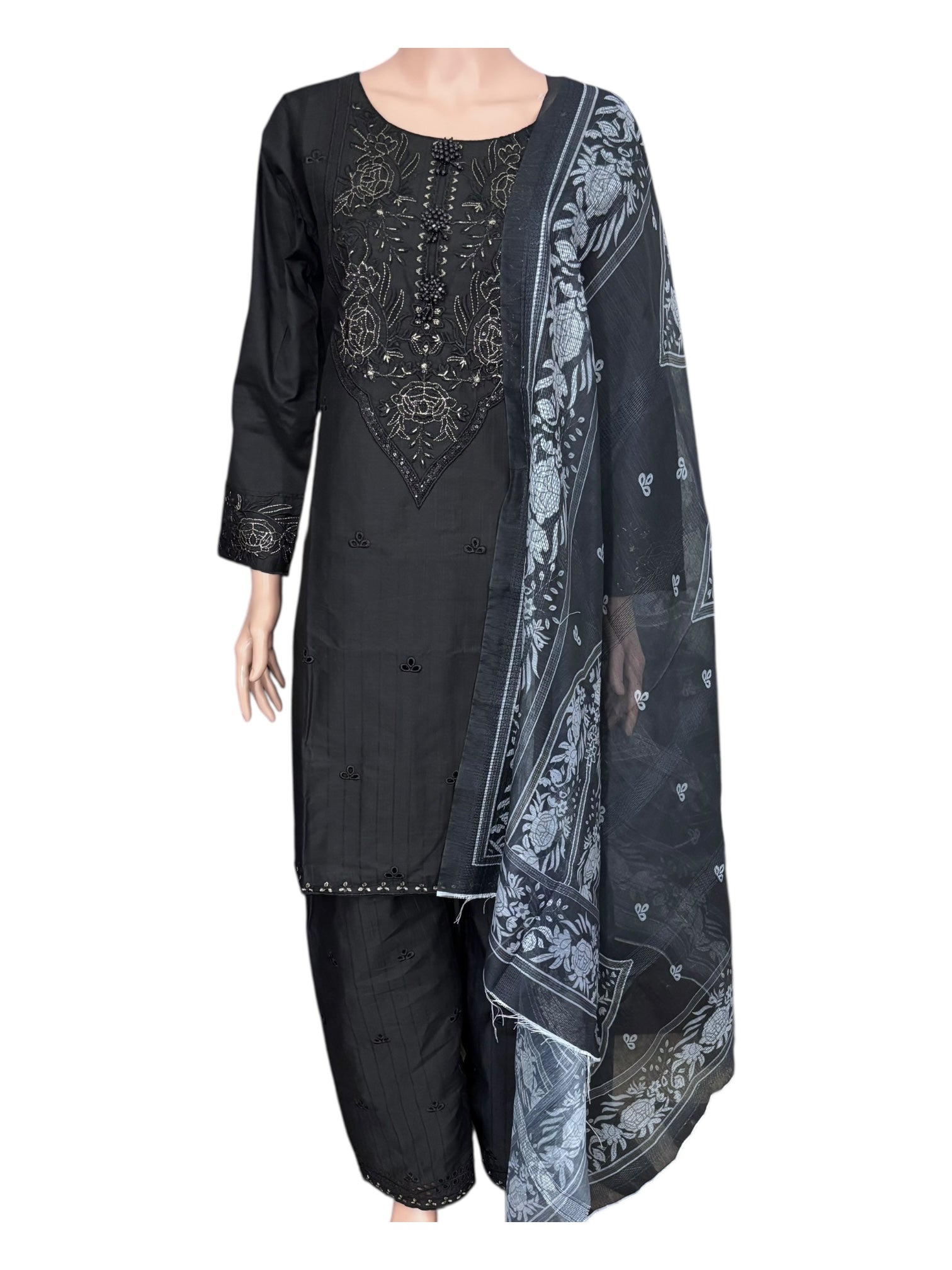 Traditional Pakistani Salwar Kameez by Saree Ghor Charlotte, featuring vibrant ethnic wear for women in elegant fabric and intricate design.