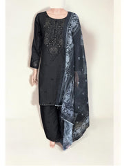 Traditional Pakistani Salwar Kameez by Saree Ghor Charlotte, vibrant ethnic wear for women with intricate design and colorful fabric.
