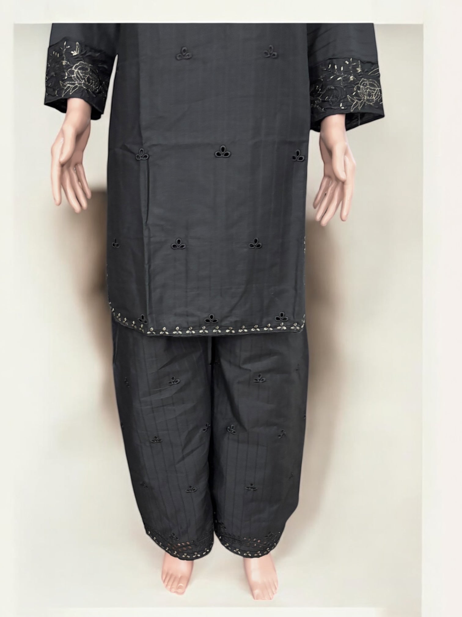 Traditional Pakistani Salwar Kameez by Saree Ghor Charlotte, featuring vibrant ethnic wear for women with intricate embroidery.