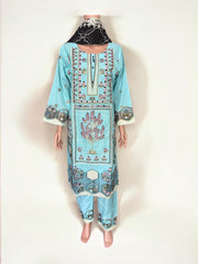 Traditional Pakistani Salwar Kameez by Saree Ghor Charlotte, showcasing vibrant ethnic wear for women with intricate embroidery.