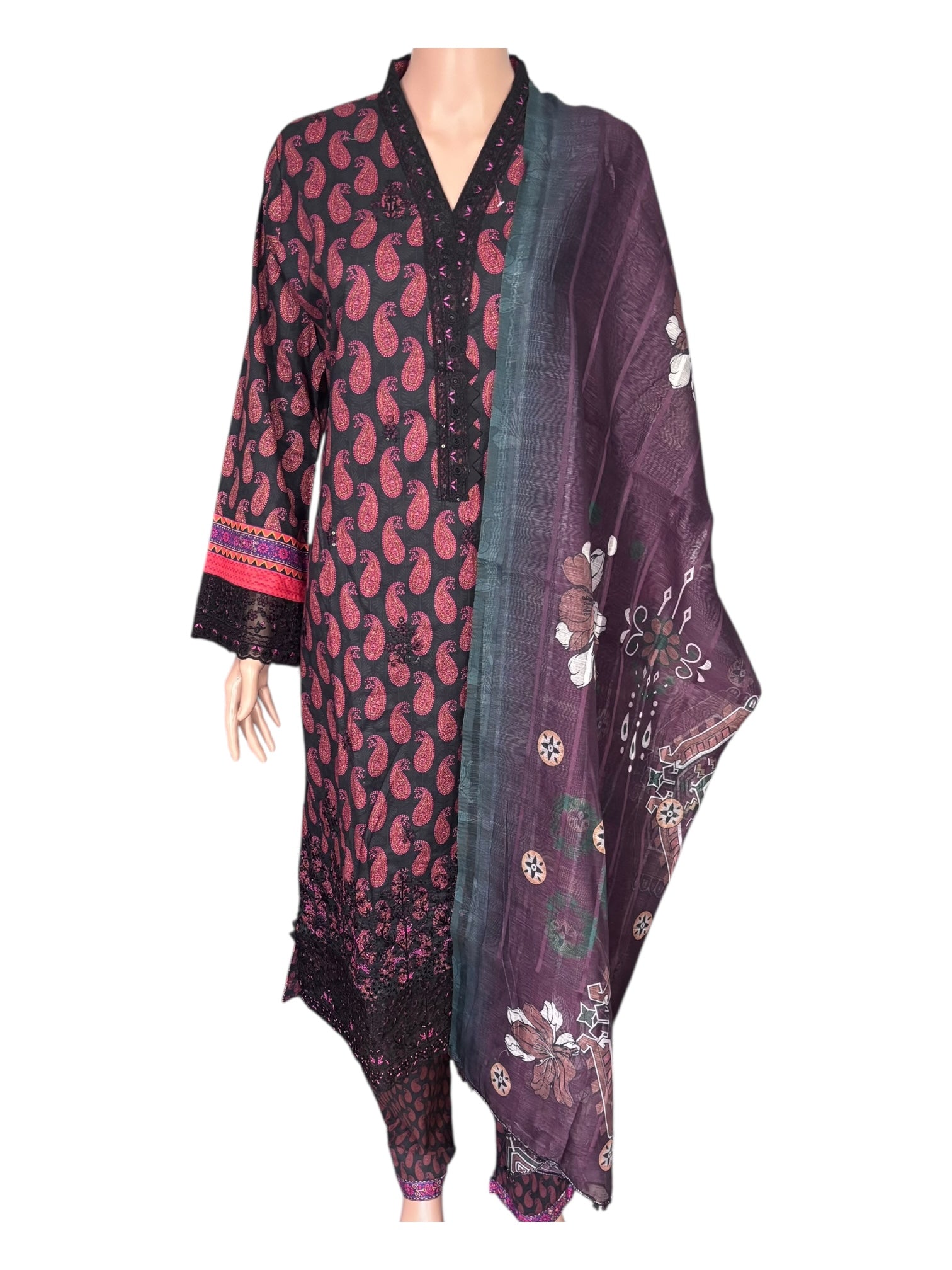 Traditional Pakistani Salwar Kameez by Saree Ghor Charlotte, featuring vibrant ethnic wear for women with intricate embroidery.
