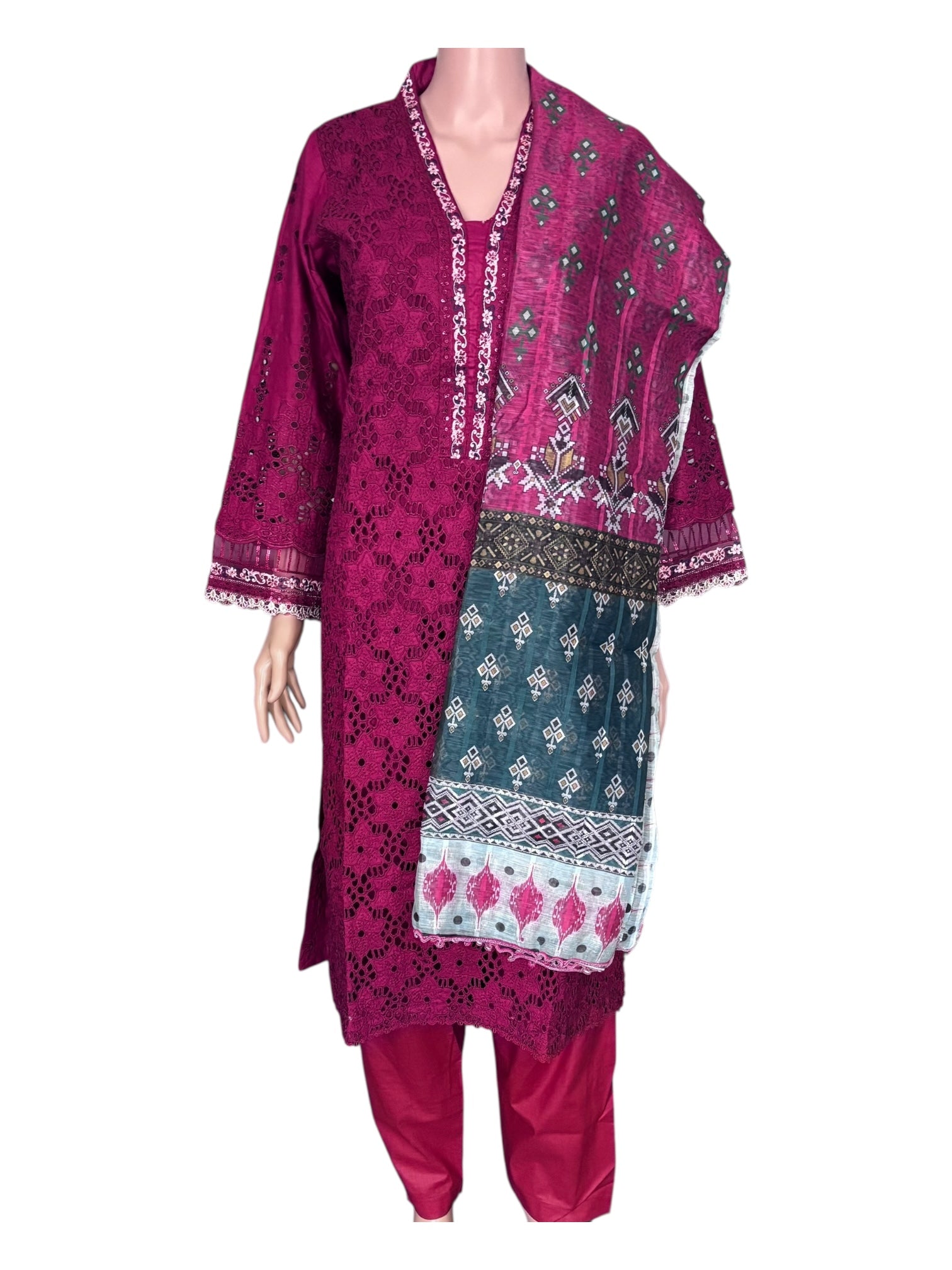 Traditional Pakistani Salwar Kameez by Saree Ghor Charlotte, elegant ethnic wear for women with intricate design details.