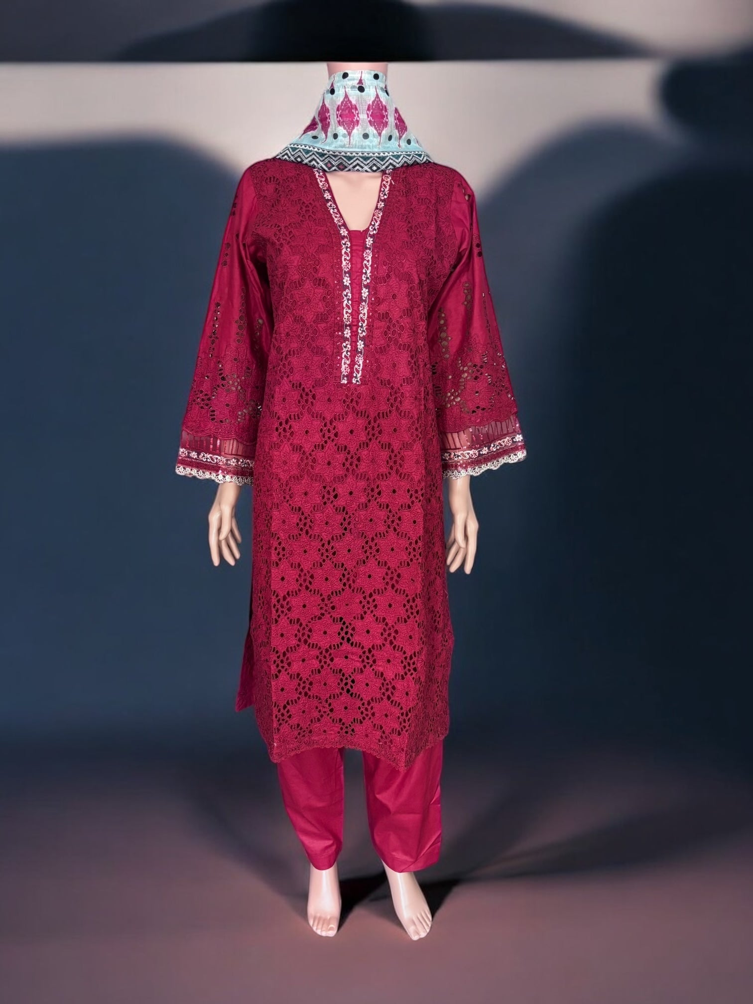 Traditional Pakistani Salwar Kameez by Saree Ghor Charlotte, featuring vibrant ethnic wear with intricate patterns for women.
