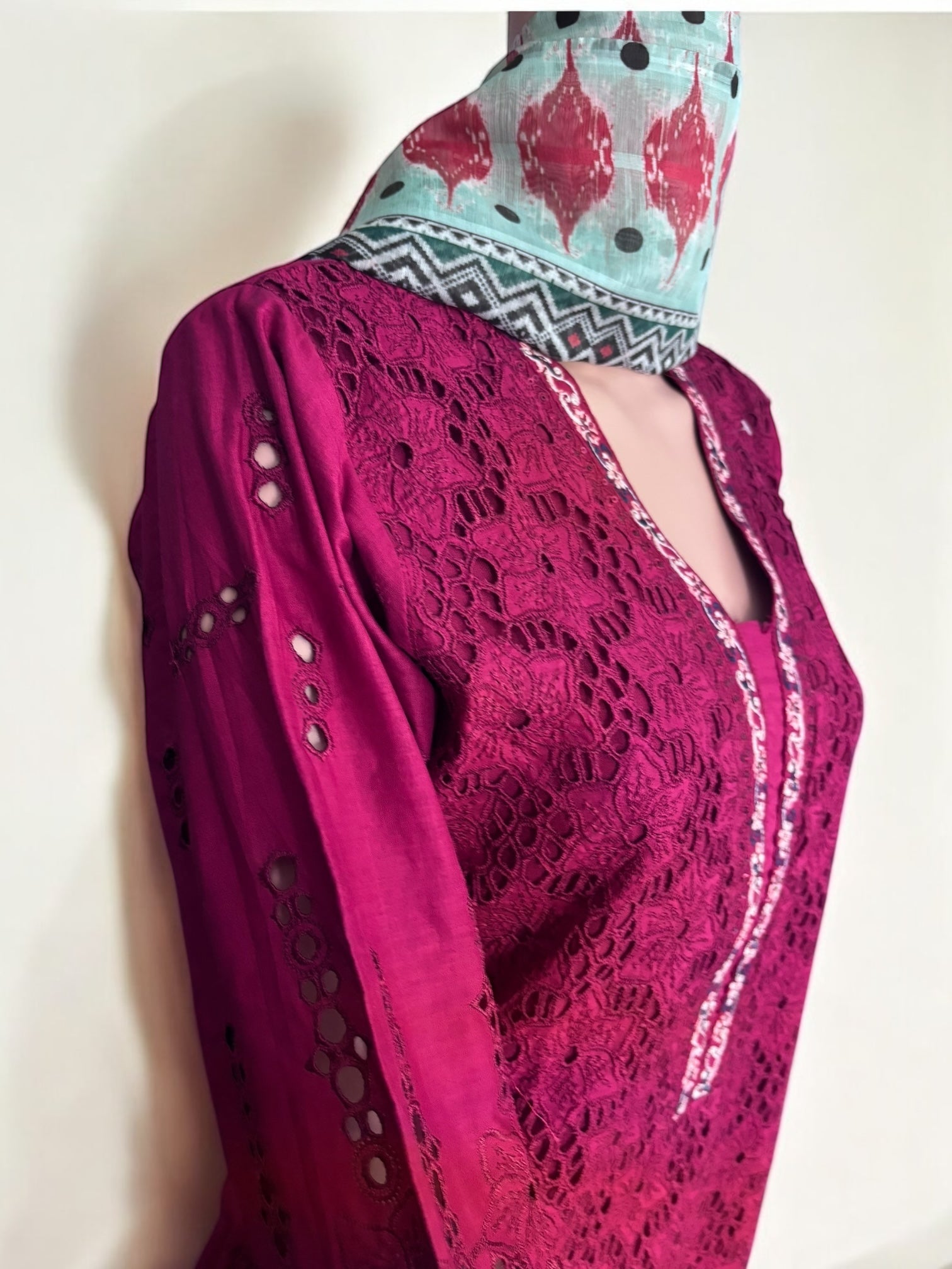 Traditional Pakistani Salwar Kameez by Saree Ghor Charlotte, featuring intricate embroidery and vibrant ethnic wear for women.