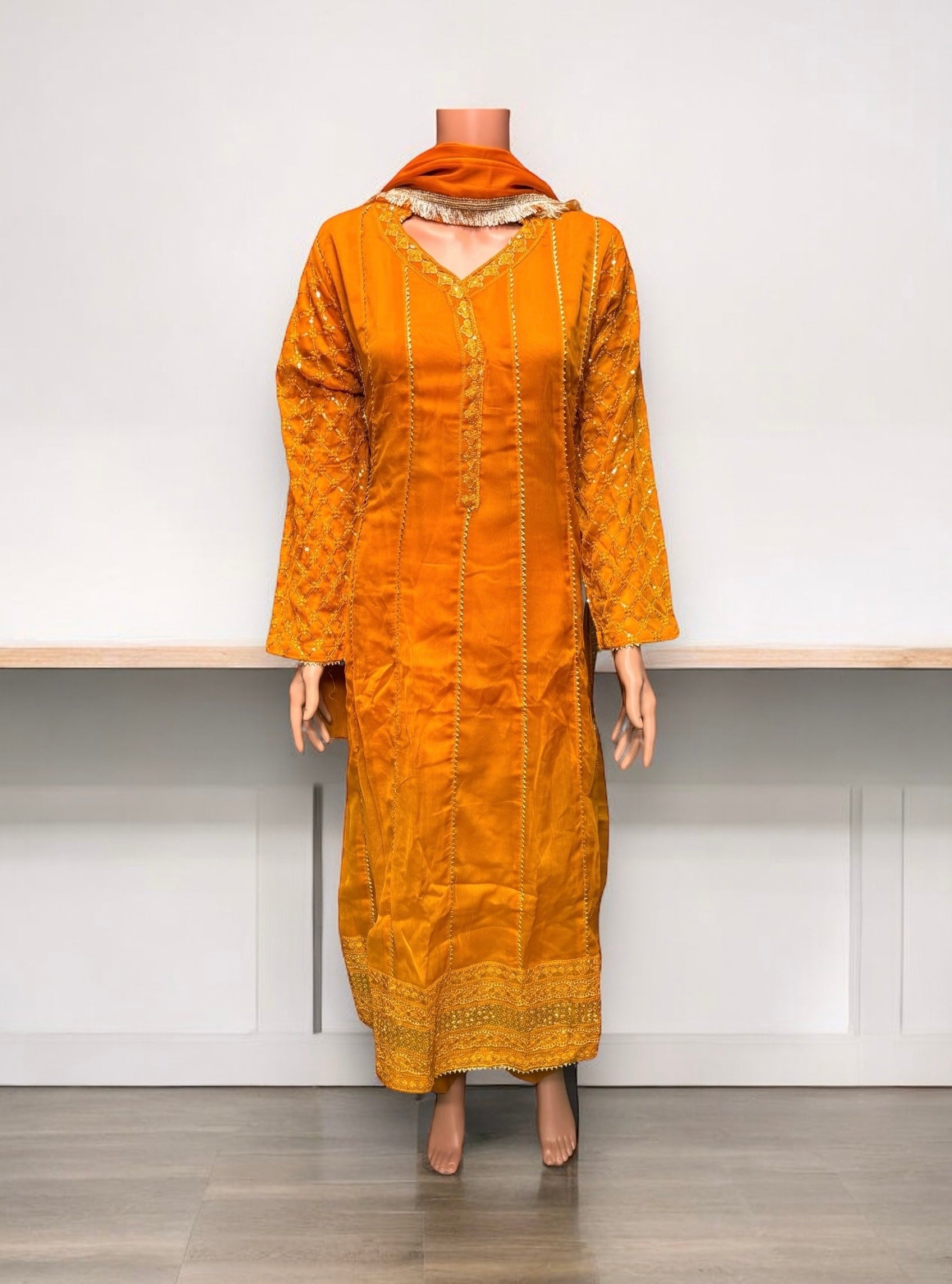 Elegant traditional Salwar Kameez dress by Saree Ghor Charlotte, ethnic party wear for women with intricate detailing.