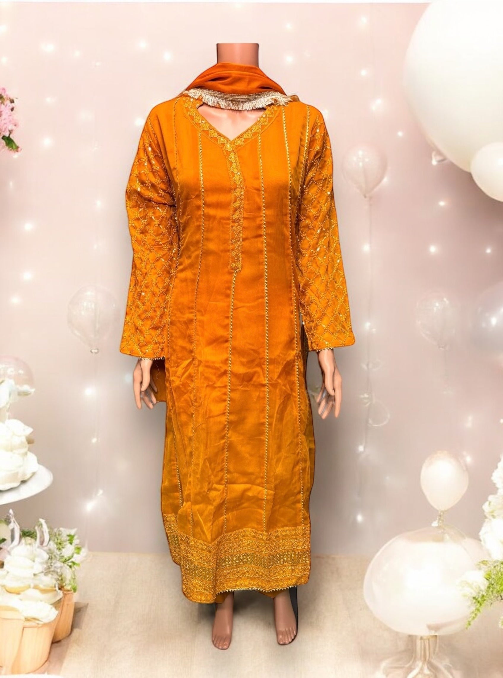 Traditional Salwar Kameez by Saree Ghor Charlotte, elegant ethnic party wear dress for women with intricate design.