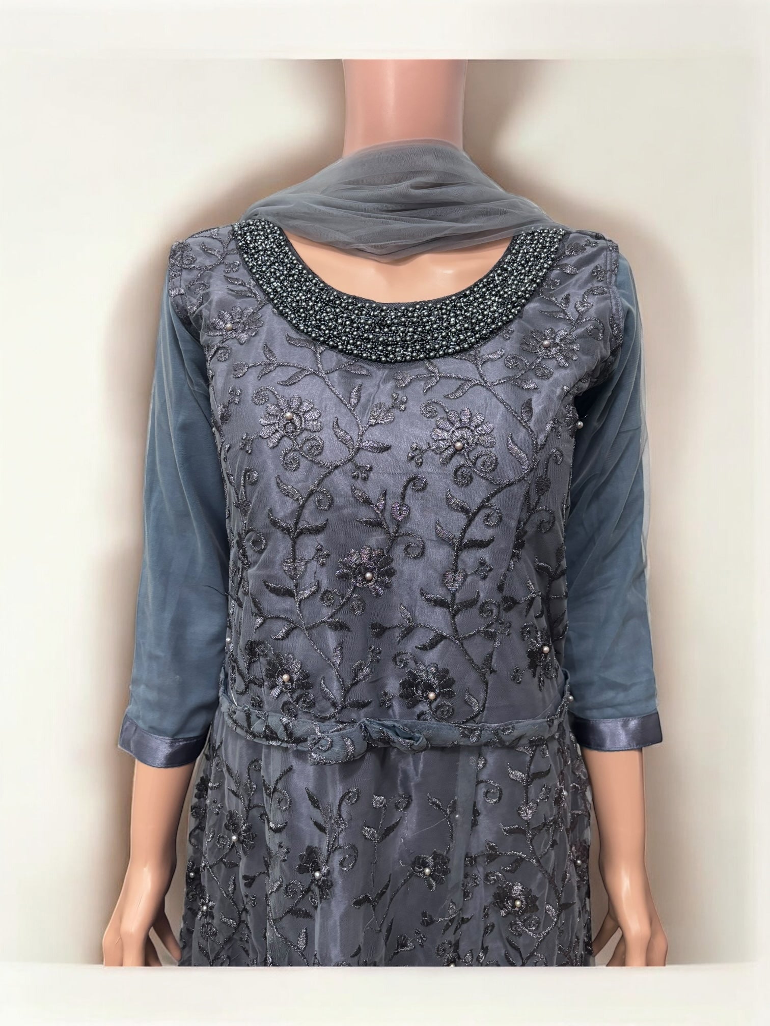 Traditional party wear gown by Saree Ghor Charlotte, women’s salwar kameez in ethnic style with intricate embroidery and vibrant fabric.