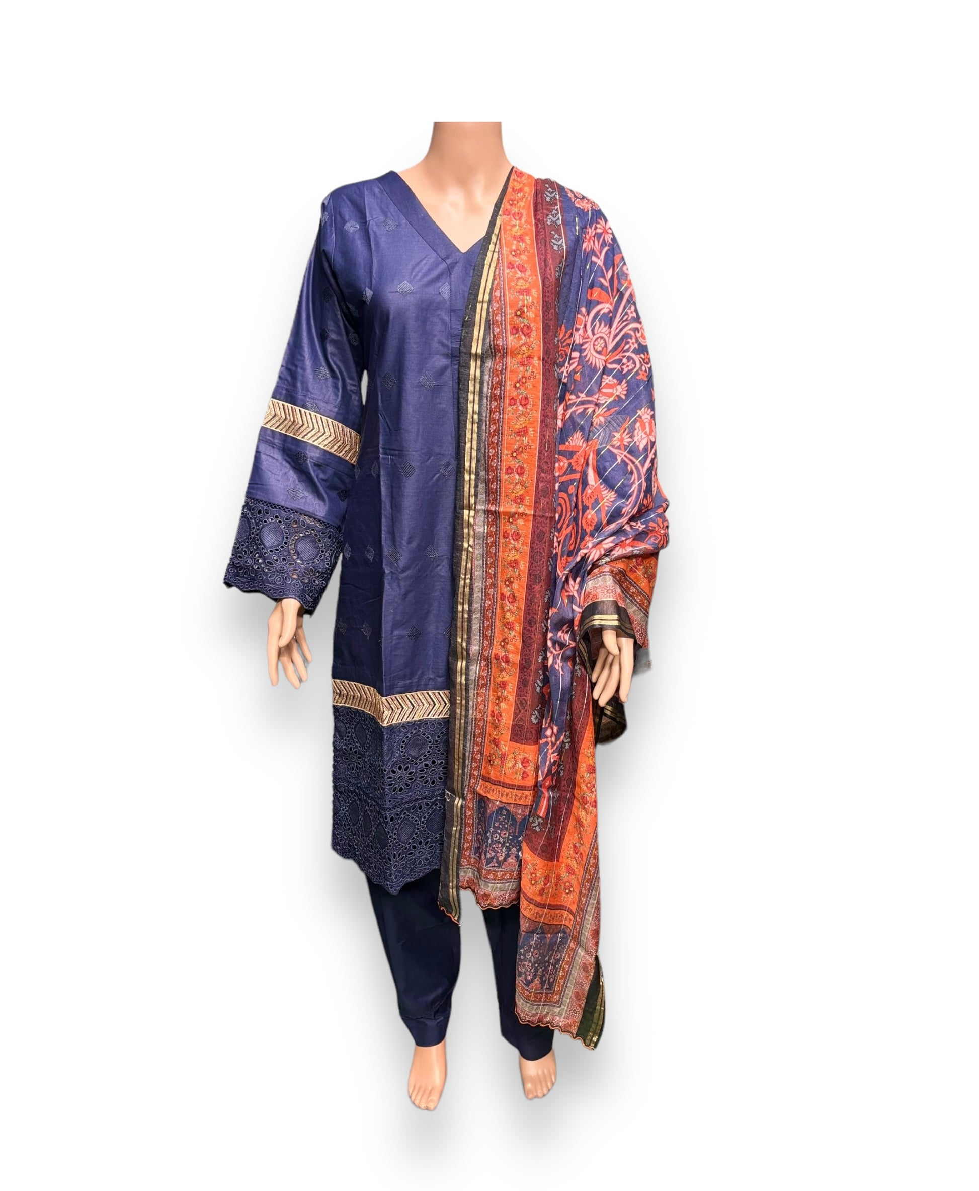 Traditional Salwar Kameez set by Saree Ghor Charlotte, ethnic wear for women, featuring vibrant fabric and intricate design.