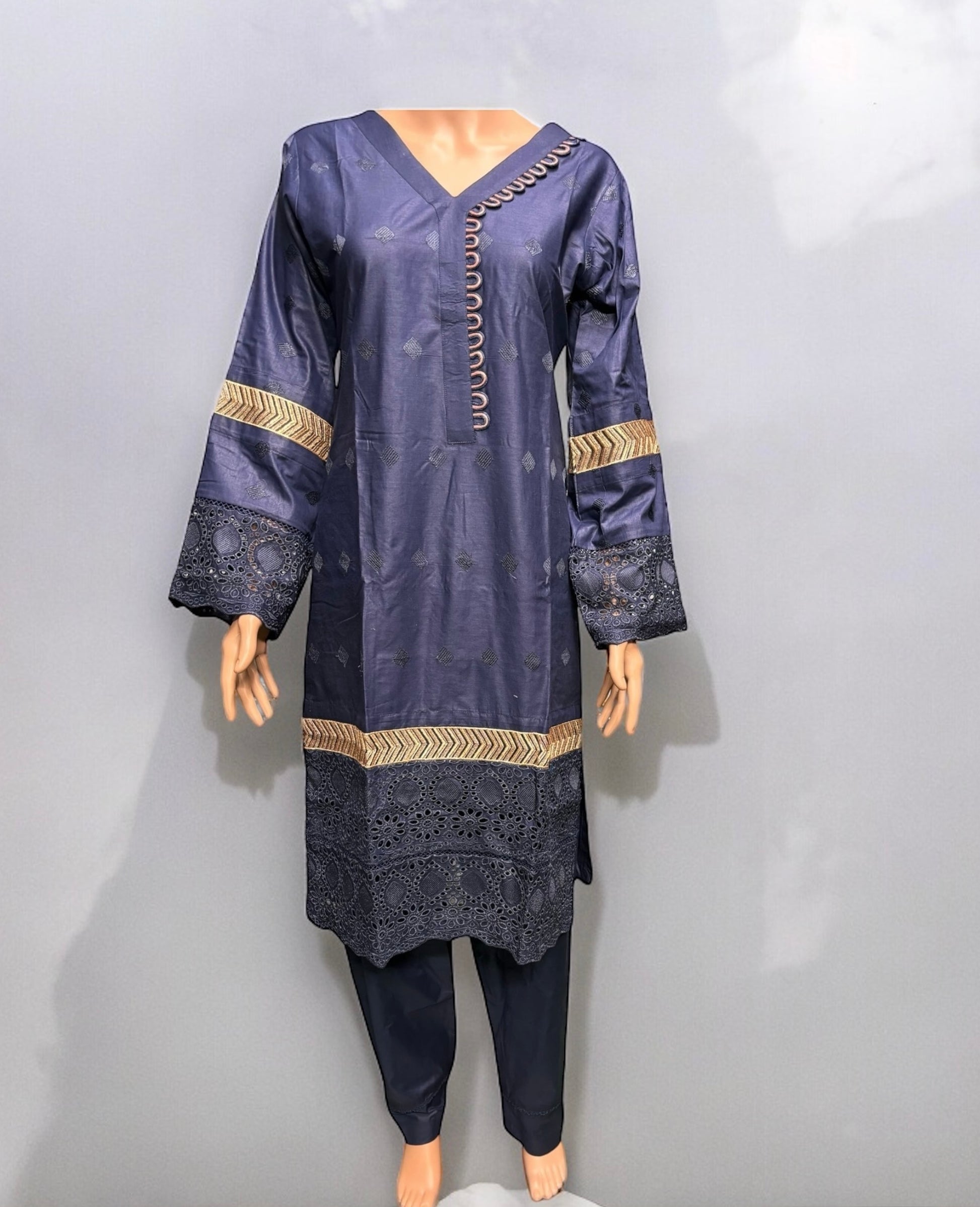 Traditional Saree Ghor Charlotte Salwar Kameez set for women, showcasing vibrant ethnic wear with intricate design details.