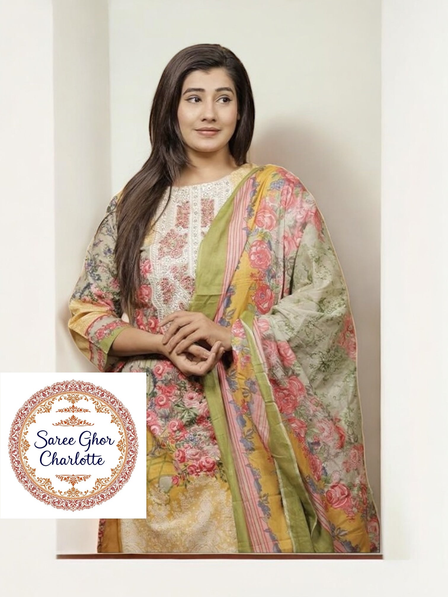 Traditional Salwar Kameez set by Saree Ghor Charlotte, ethnic women's wear with intricate embroidery and vibrant fabric.