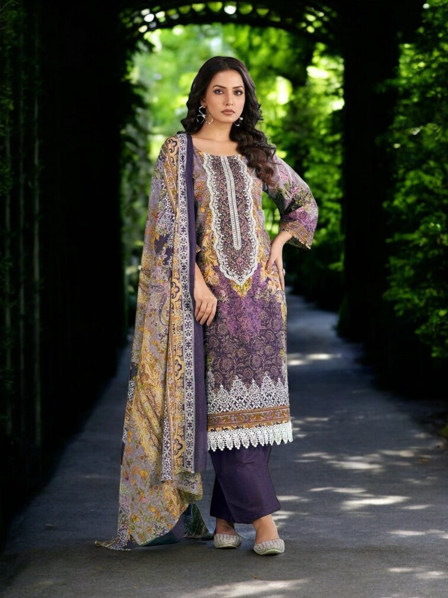 Traditional Salwar Kameez set by Saree Ghor Charlotte featuring intricate embroidery and vibrant fabric for women’s ethnic wear.