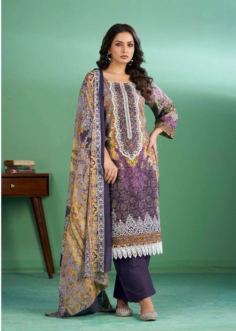 Traditional Salwar Kameez set by Saree Ghor Charlotte, featuring ethnic wear for women with intricate fabric and vibrant design.