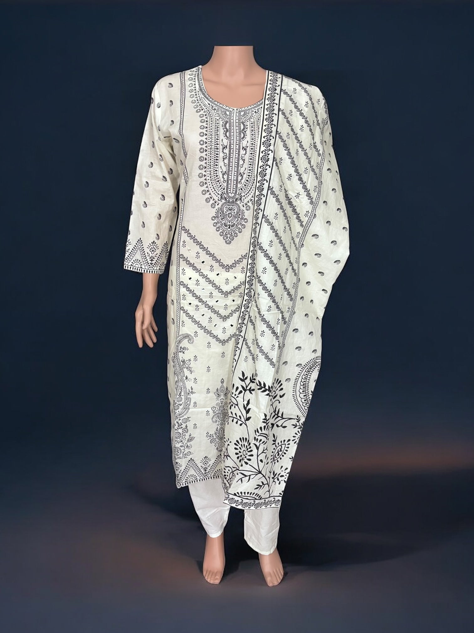 Traditional Salwar Kameez set by Saree Ghor Charlotte, vibrant ethnic wear for women, featuring intricate designs and colorful fabric.