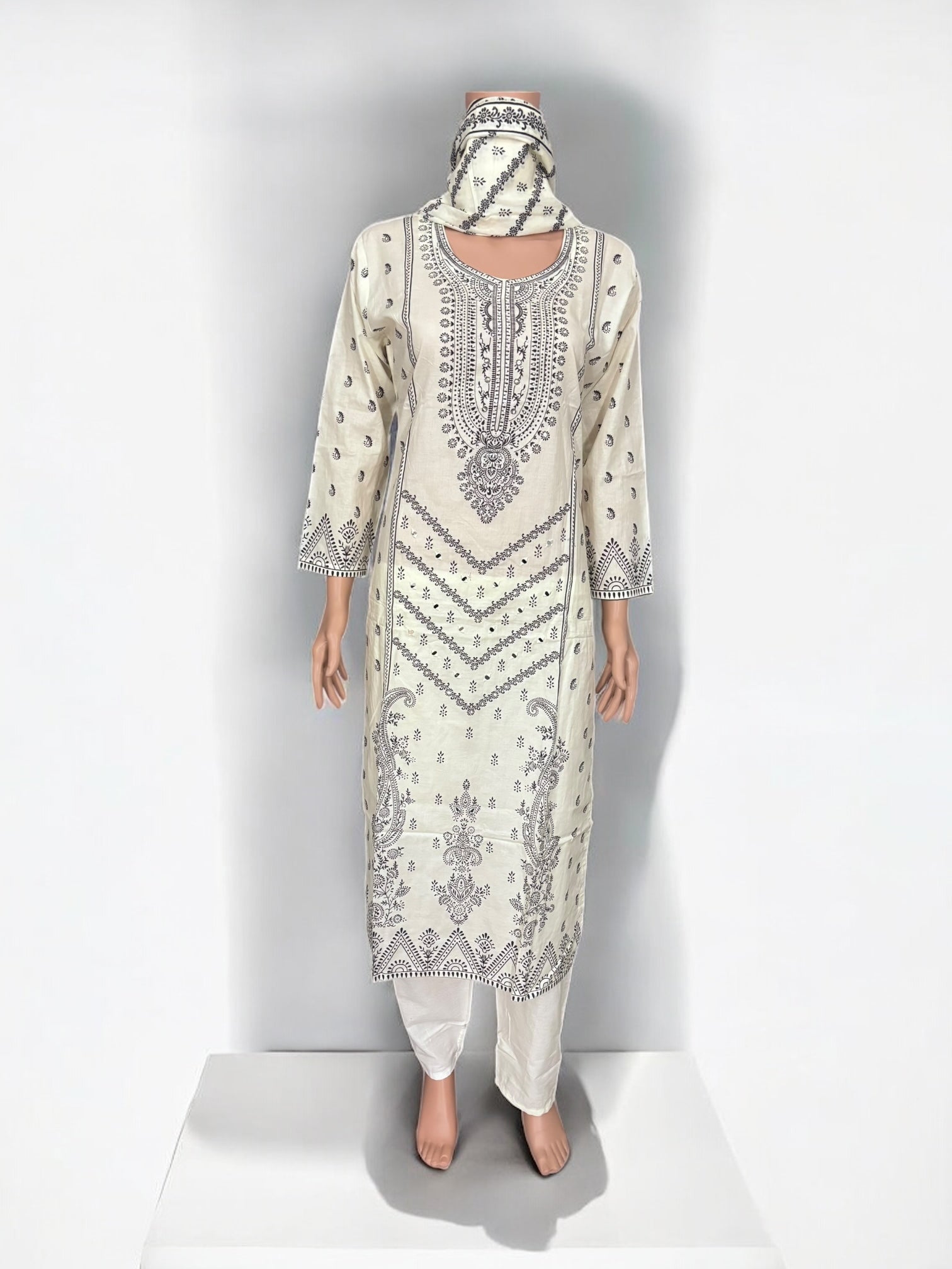 Traditional Salwar Kameez set by Saree Ghor Charlotte, ethnic women’s wear with vibrant fabric and intricate embroidery details.
