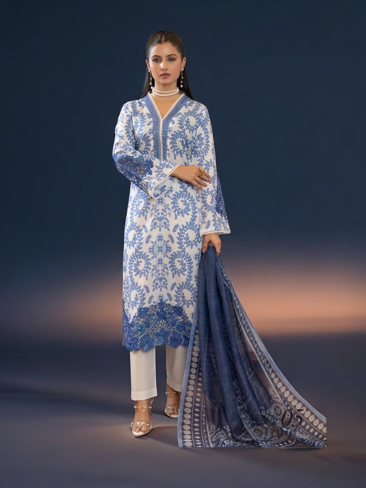 Pakistani Salwar Kameez set by Saree Ghor Charlotte, traditional ethnic wear for women featuring colorful fabric and intricate design.