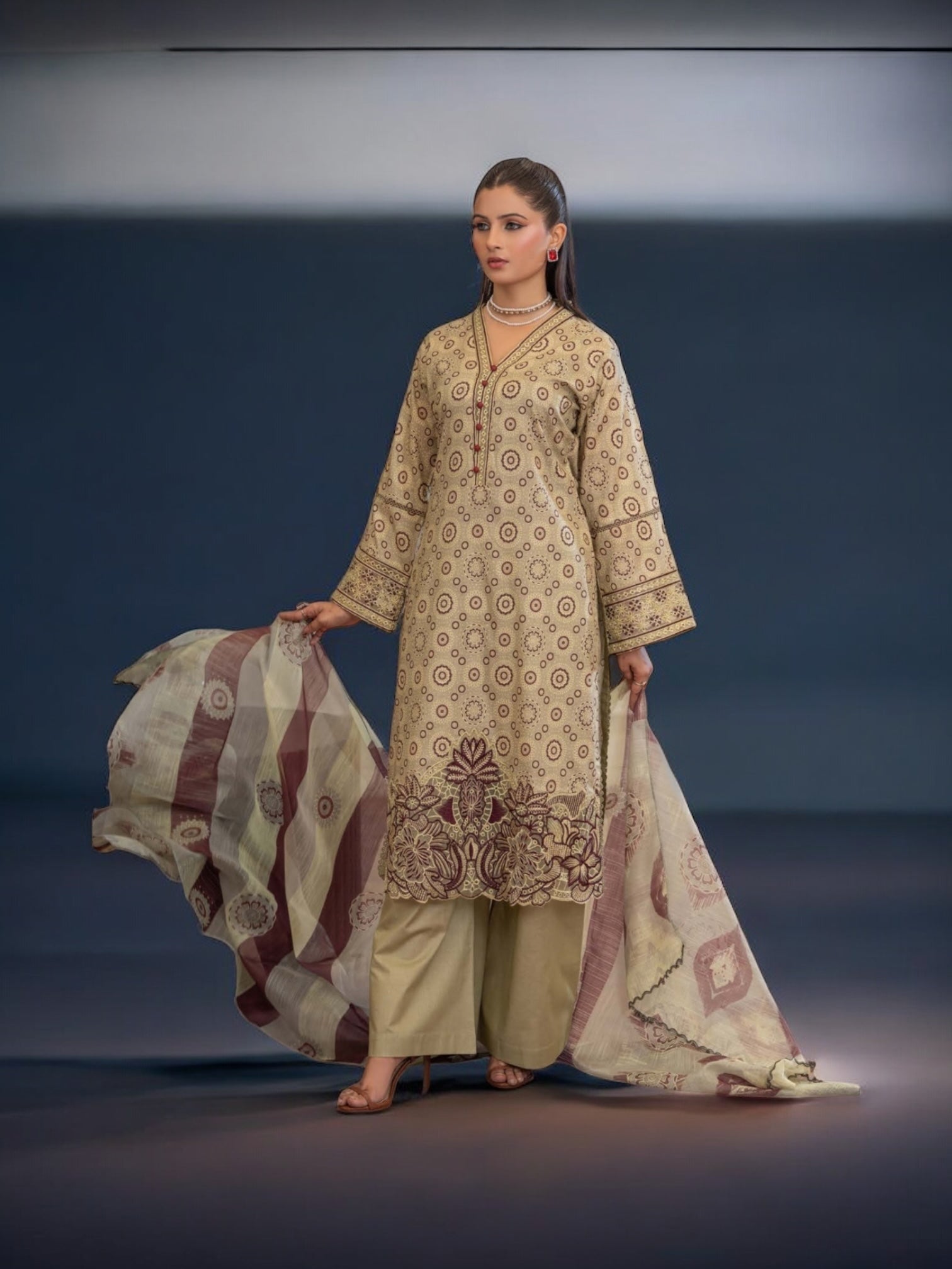 Pakistani Salwar Kameez set by Saree Ghor Charlotte, traditional ethnic wear for women, featuring colorful kurta and matching dupatta.