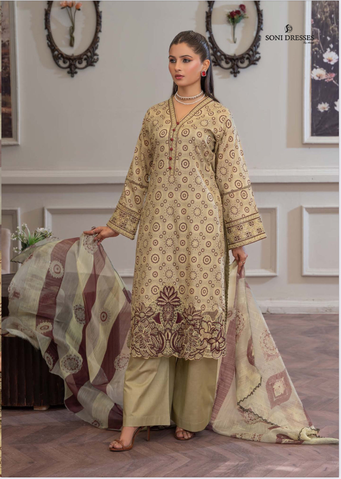 Pakistani Salwar Kameez set by Saree Ghor Charlotte, traditional ethnic wear for women featuring vibrant fabric and intricate design.