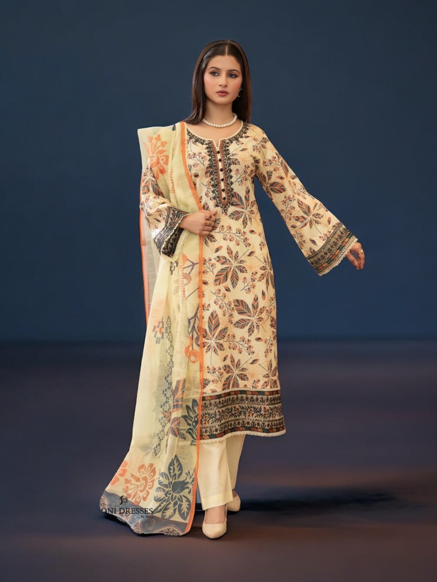Pakistani Salwar Kameez set by Saree Ghor Charlotte, traditional ethnic wear for women, with vibrant kurta and matching salwar.