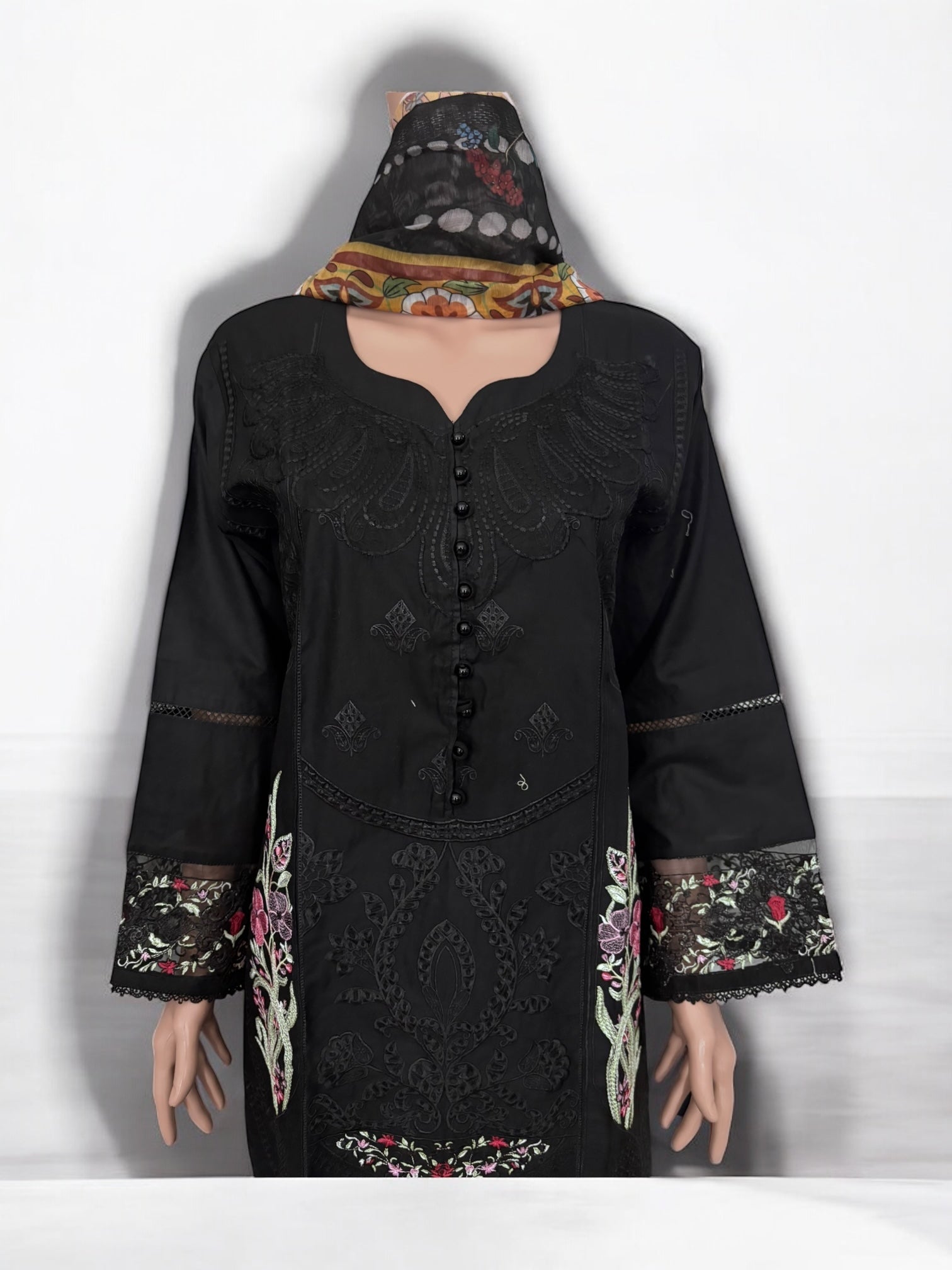Traditional Salwar Kameez set by Saree Ghor Charlotte, ethnic wear for women featuring intricate patterns and vibrant fabric.