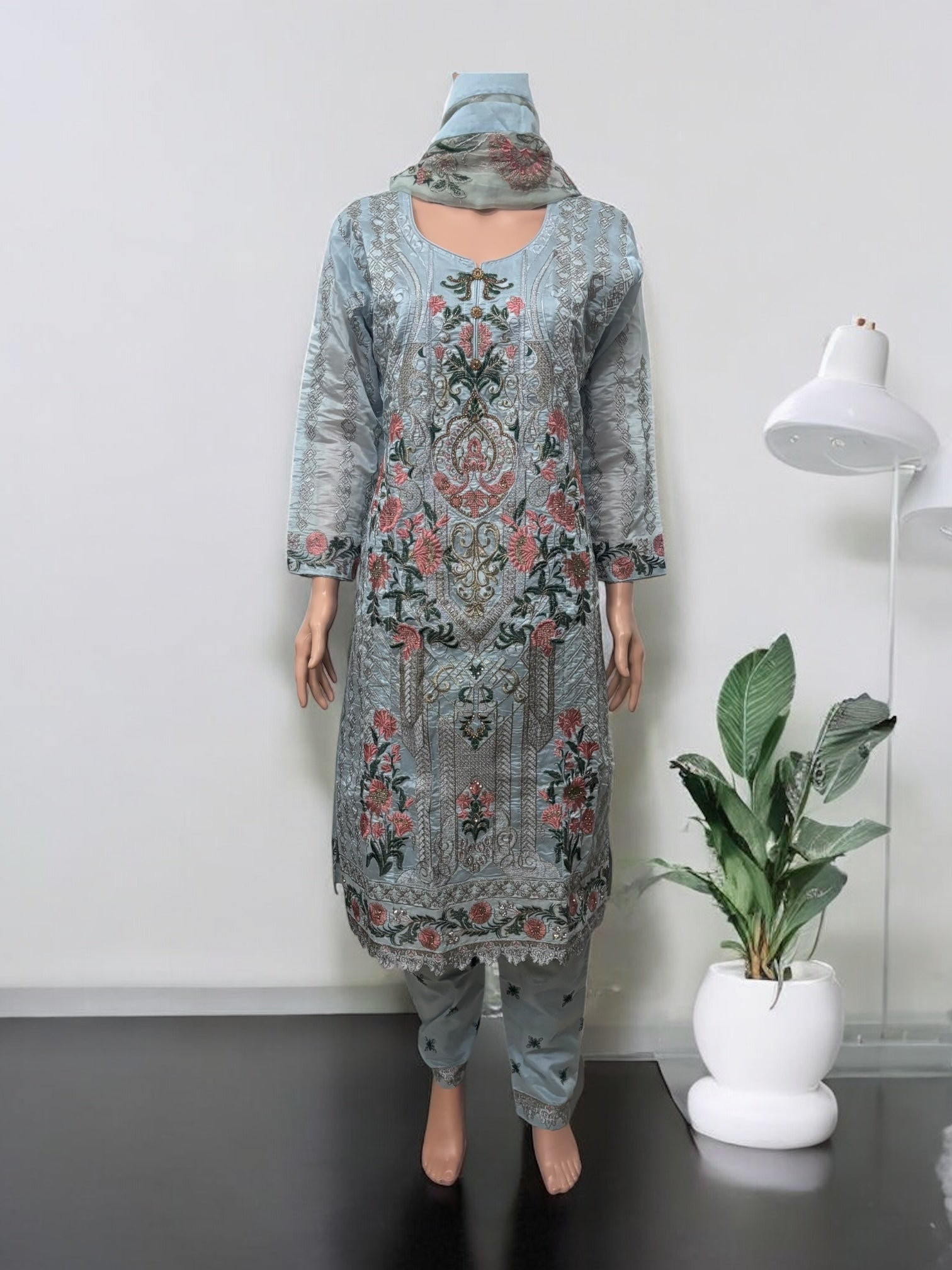 Traditional Saree Ghor Charlotte Salwar Kameez set for women, featuring ethnic wear with intricate details and vibrant fabric.