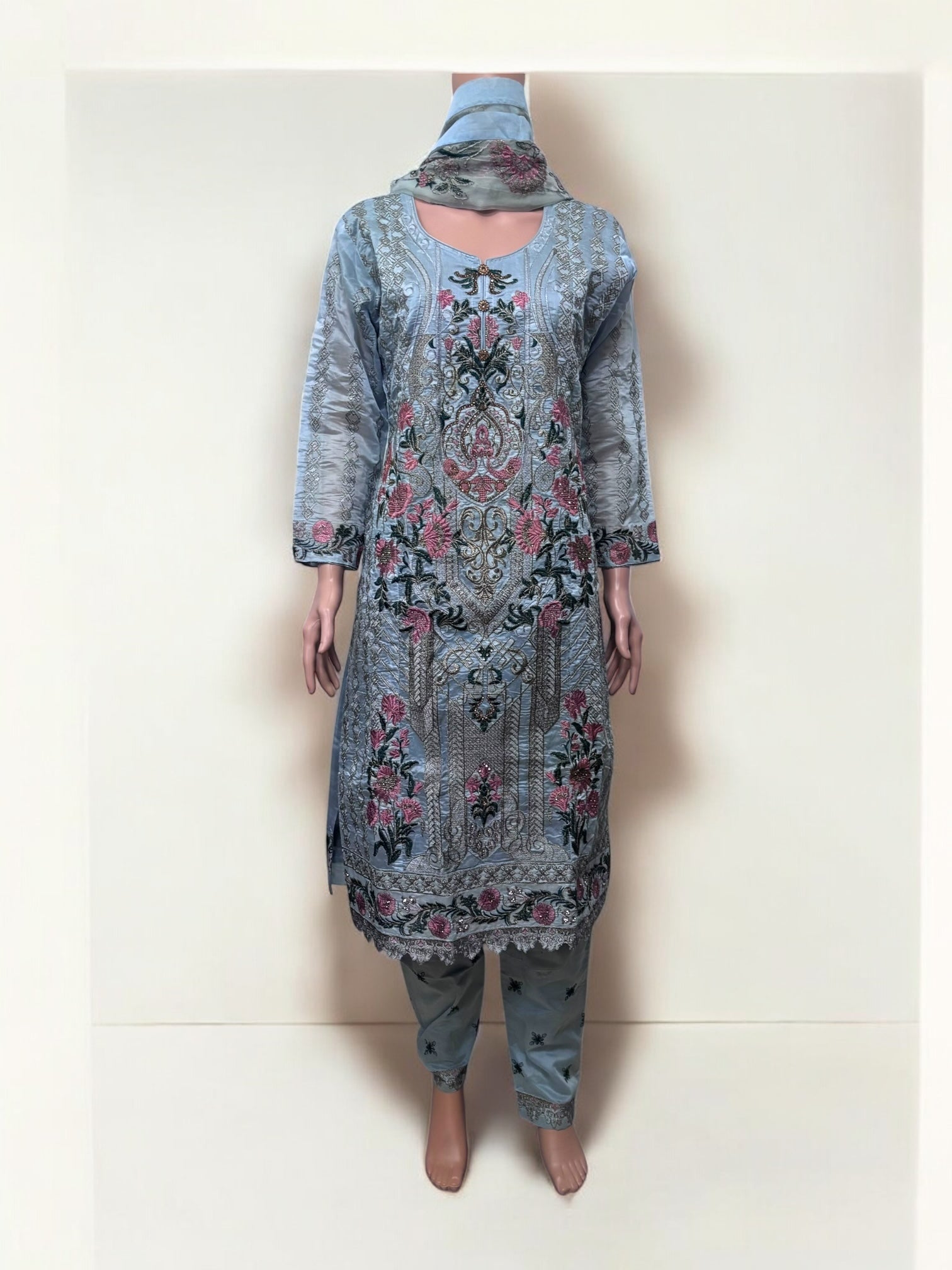 Traditional Saree Ghor Charlotte Salwar Kameez set for women, showcasing vibrant ethnic wear with intricate details and colorful fabric.