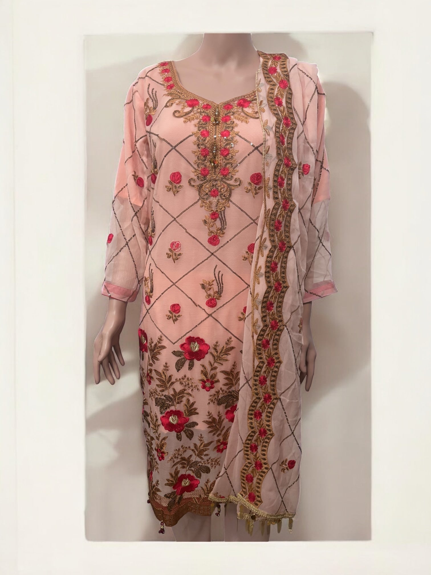 Traditional Saree Ghor Charlotte Salwar Kameez set for women, featuring ethnic wear with vibrant fabric and intricate design details.