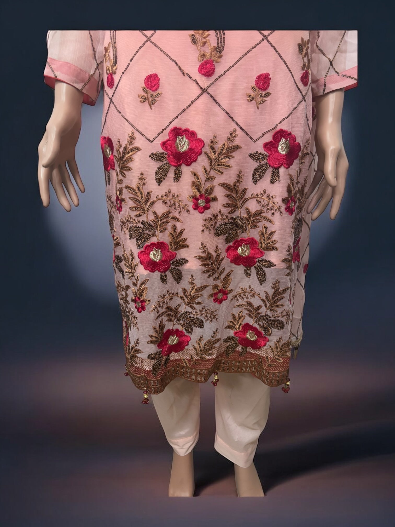 Traditional Salwar Kameez set by Saree Ghor Charlotte, ethnic women's wear with intricate designs and vibrant colors.