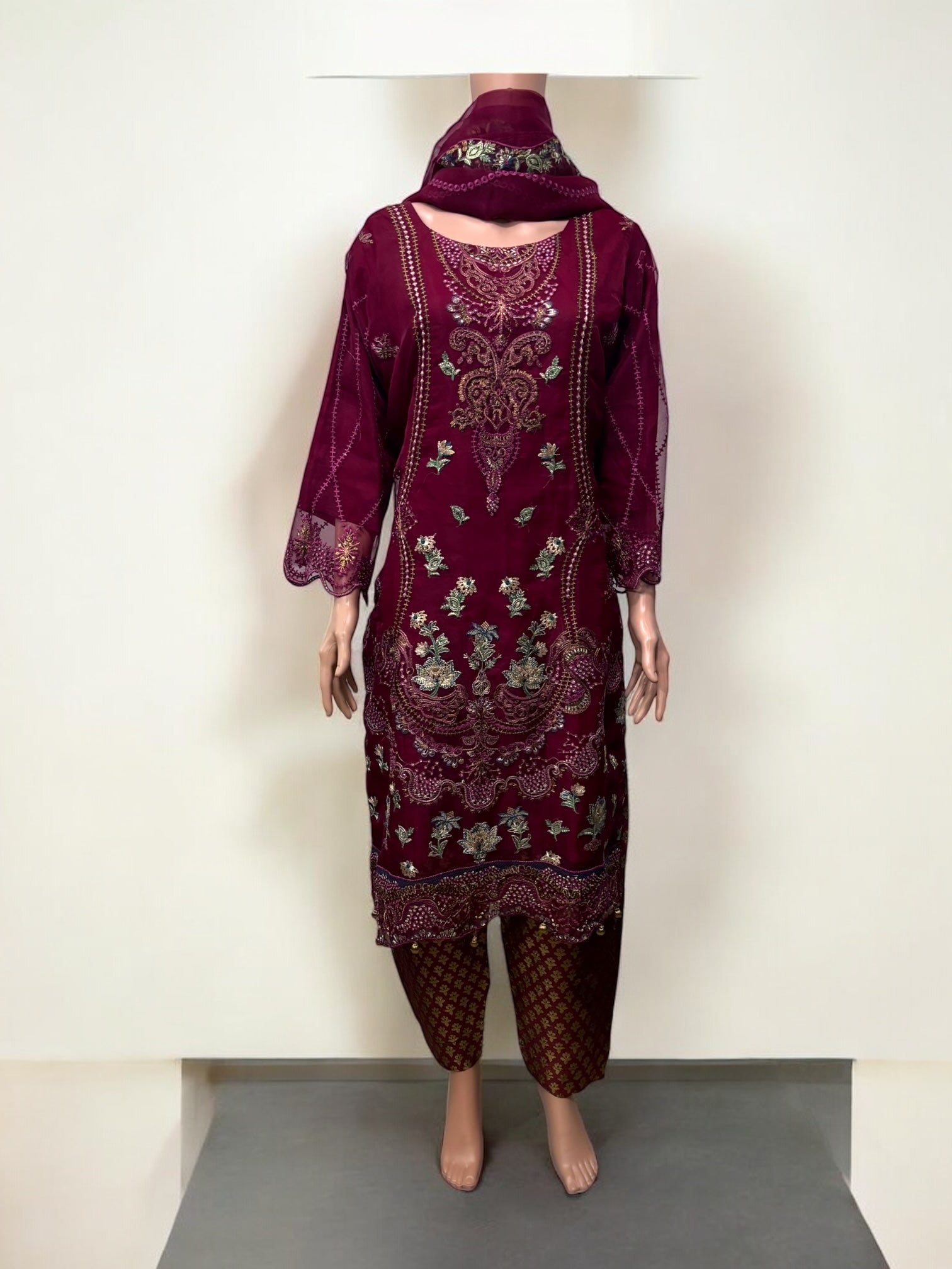 Traditional Saree Ghor Charlotte Salwar Kameez set for women, featuring ethnic wear with intricate embroidery and vibrant colors.