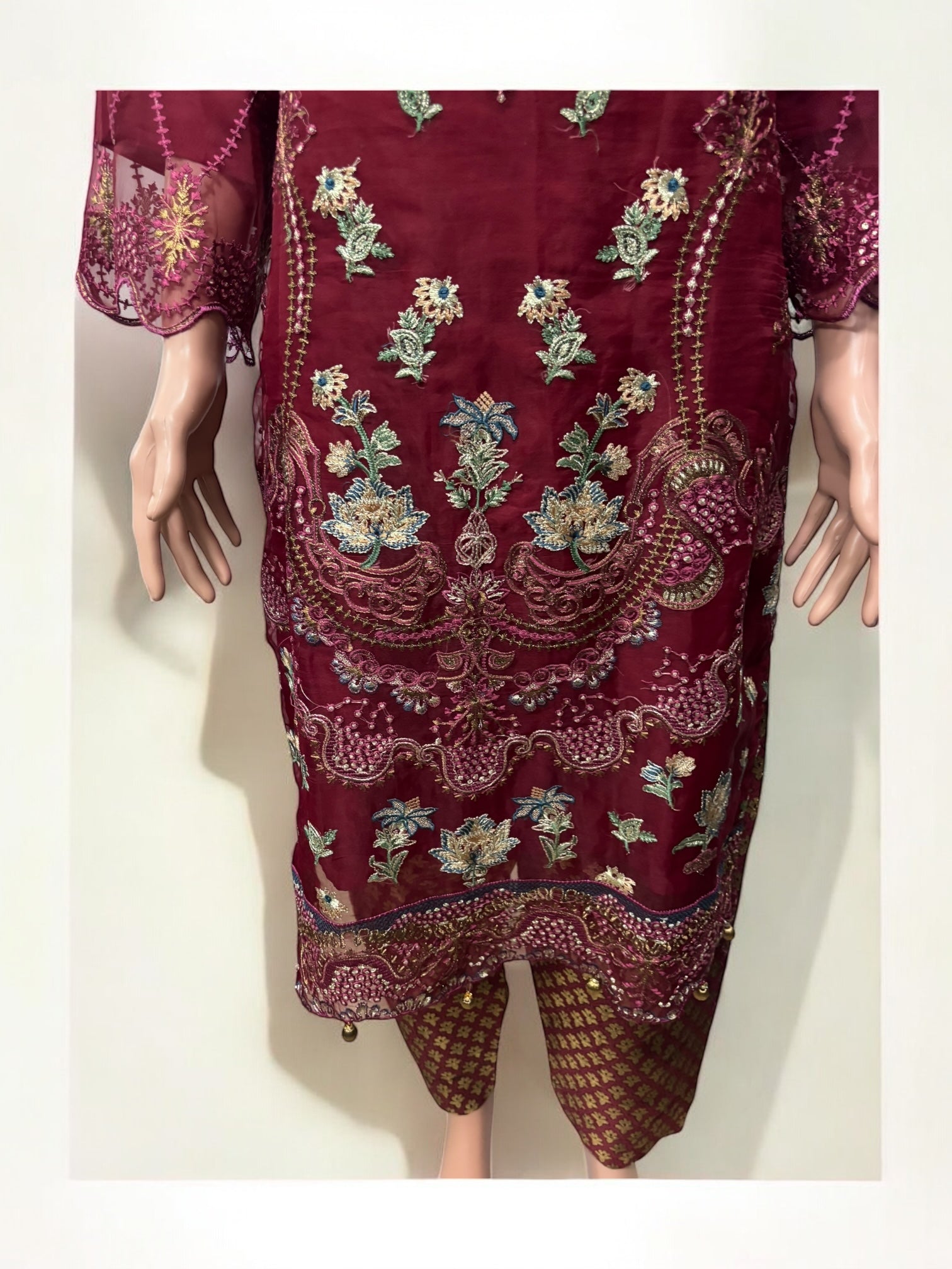 Traditional Saree Ghor Charlotte Salwar Kameez set for women, with intricate ethnic design and vibrant fabric.